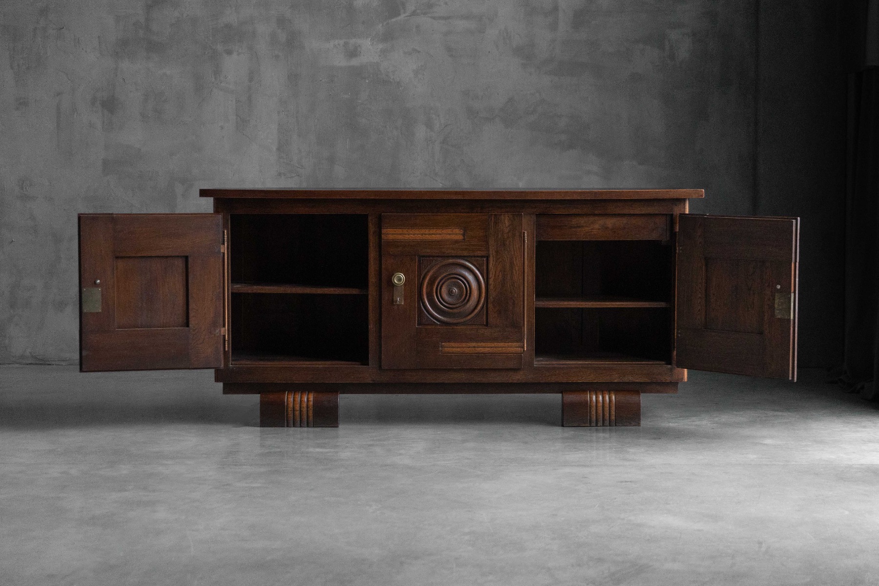 Art Deco sideboard with block feet and geometric front