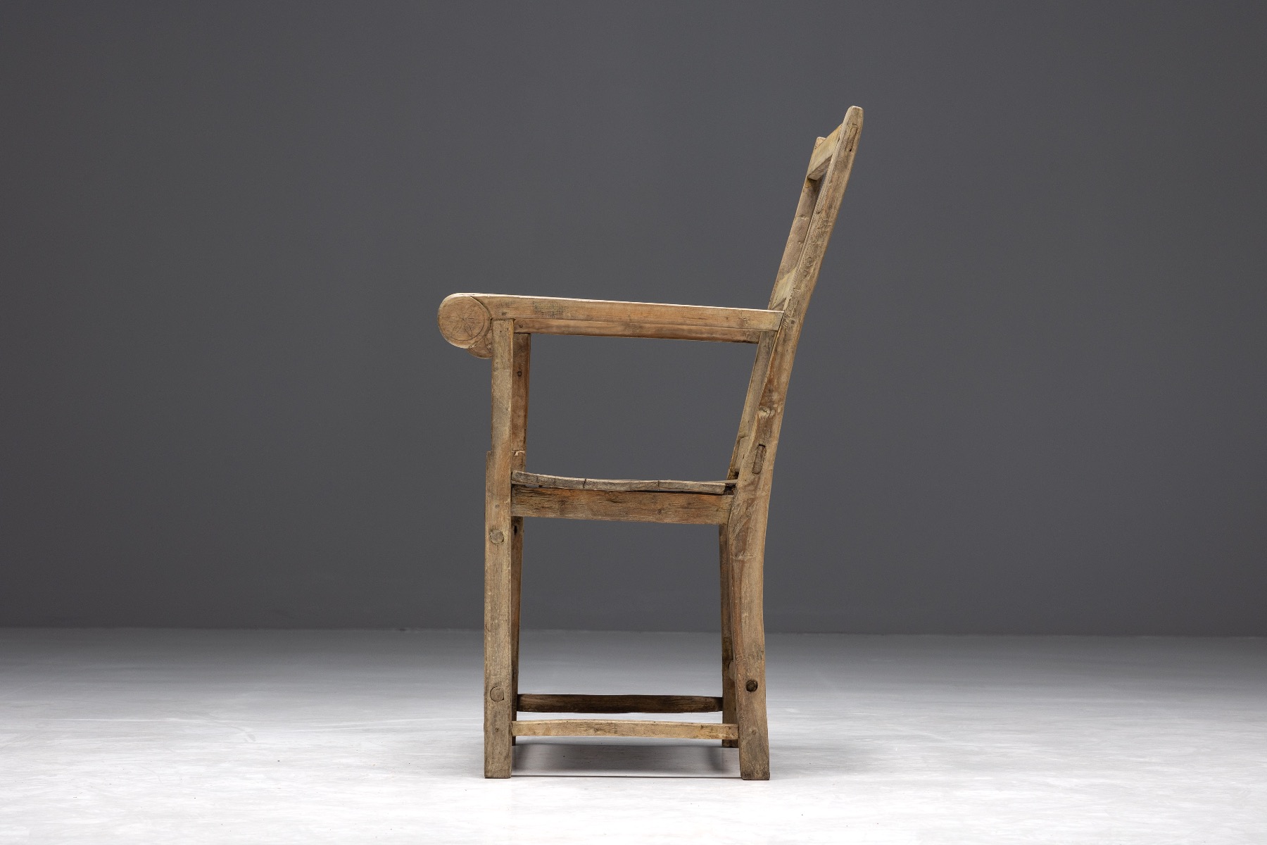 Handcrafted art populaire armchair in solid wood