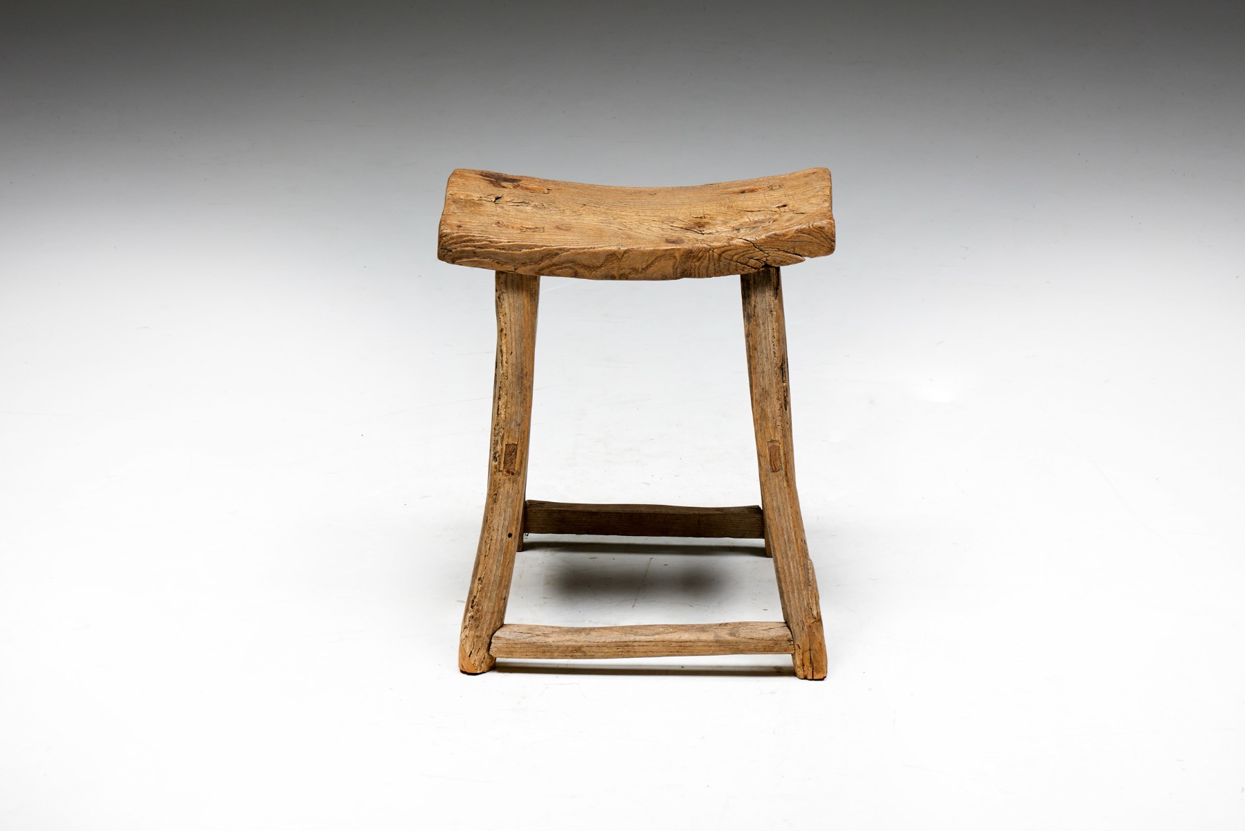 Handcrafted folk art stool in rural style
