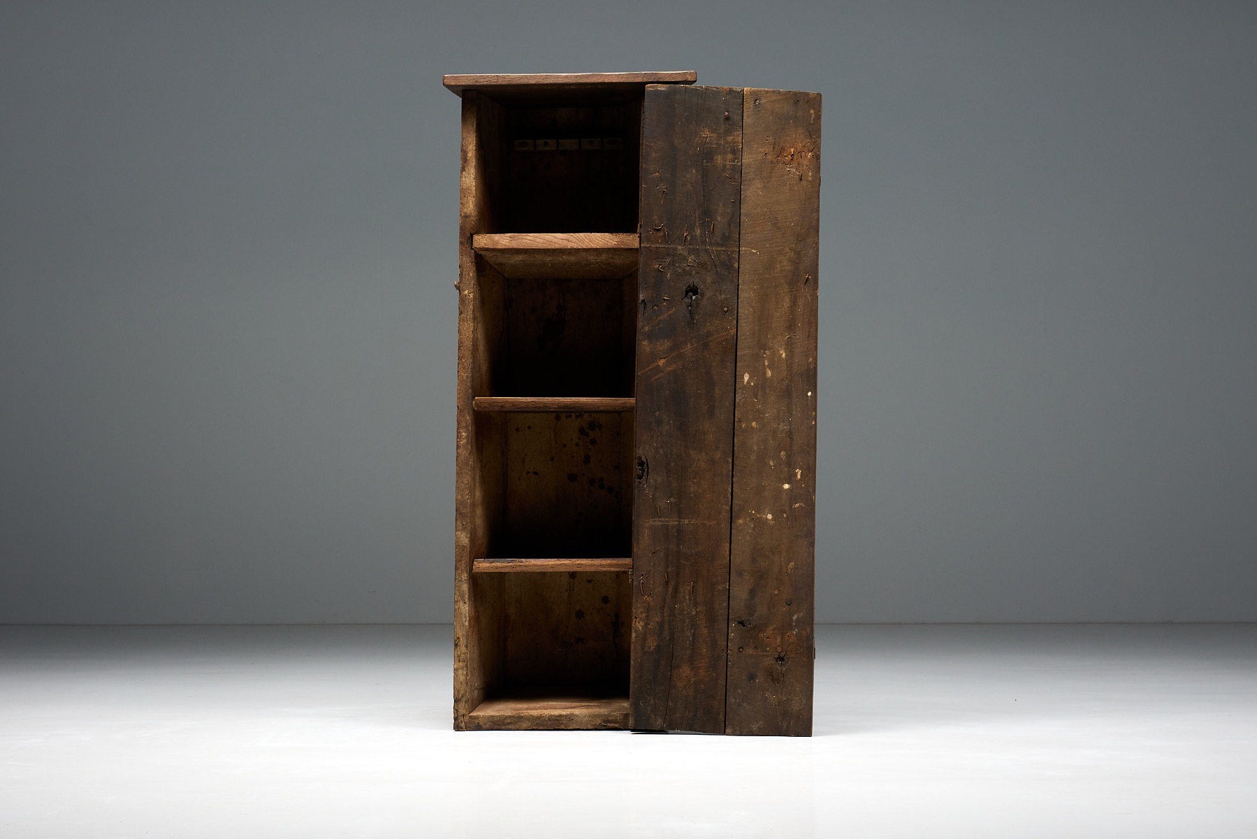 Handcrafted monoxylite cupboard in solid form