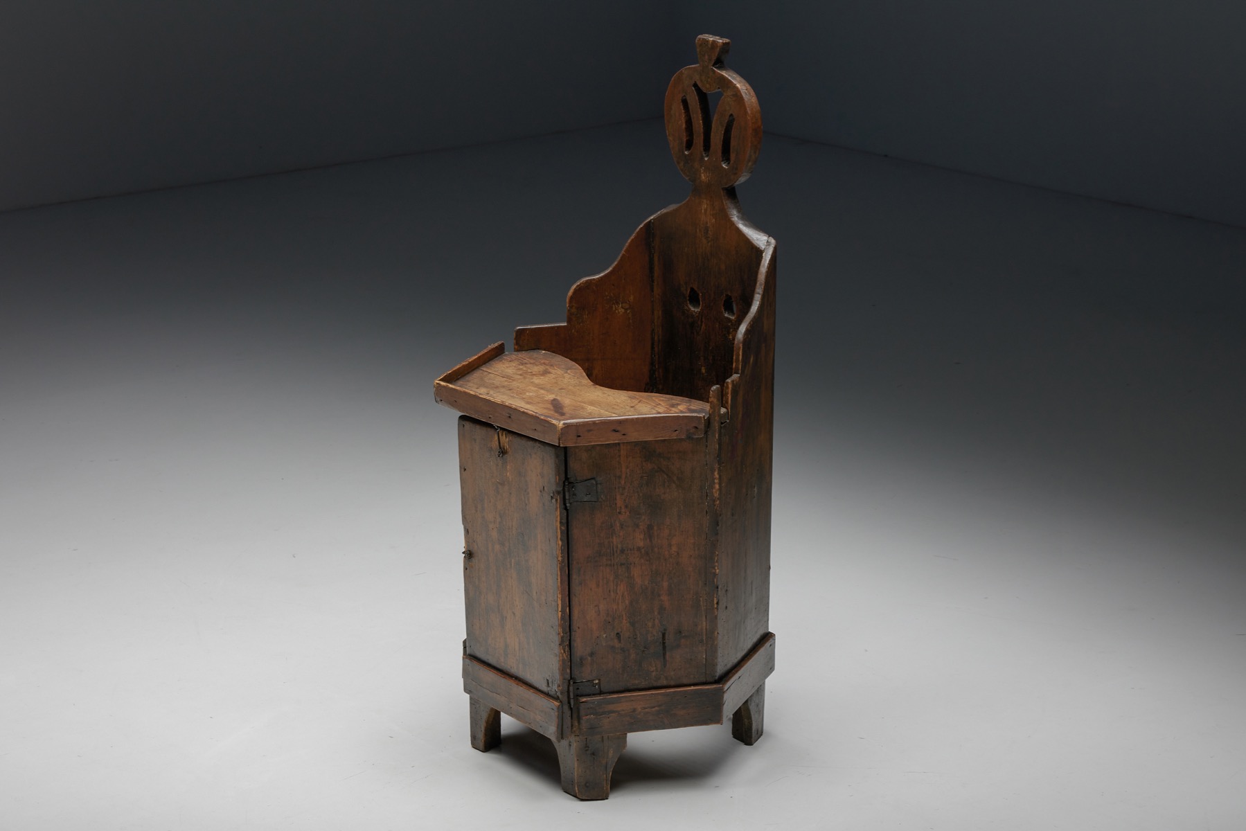 Handcrafted wooden child chair with compartment