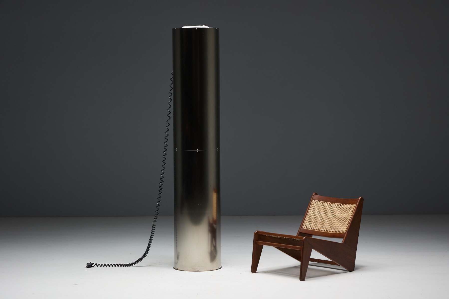 Industrial stainless steel uplighter reflecting 1970s design