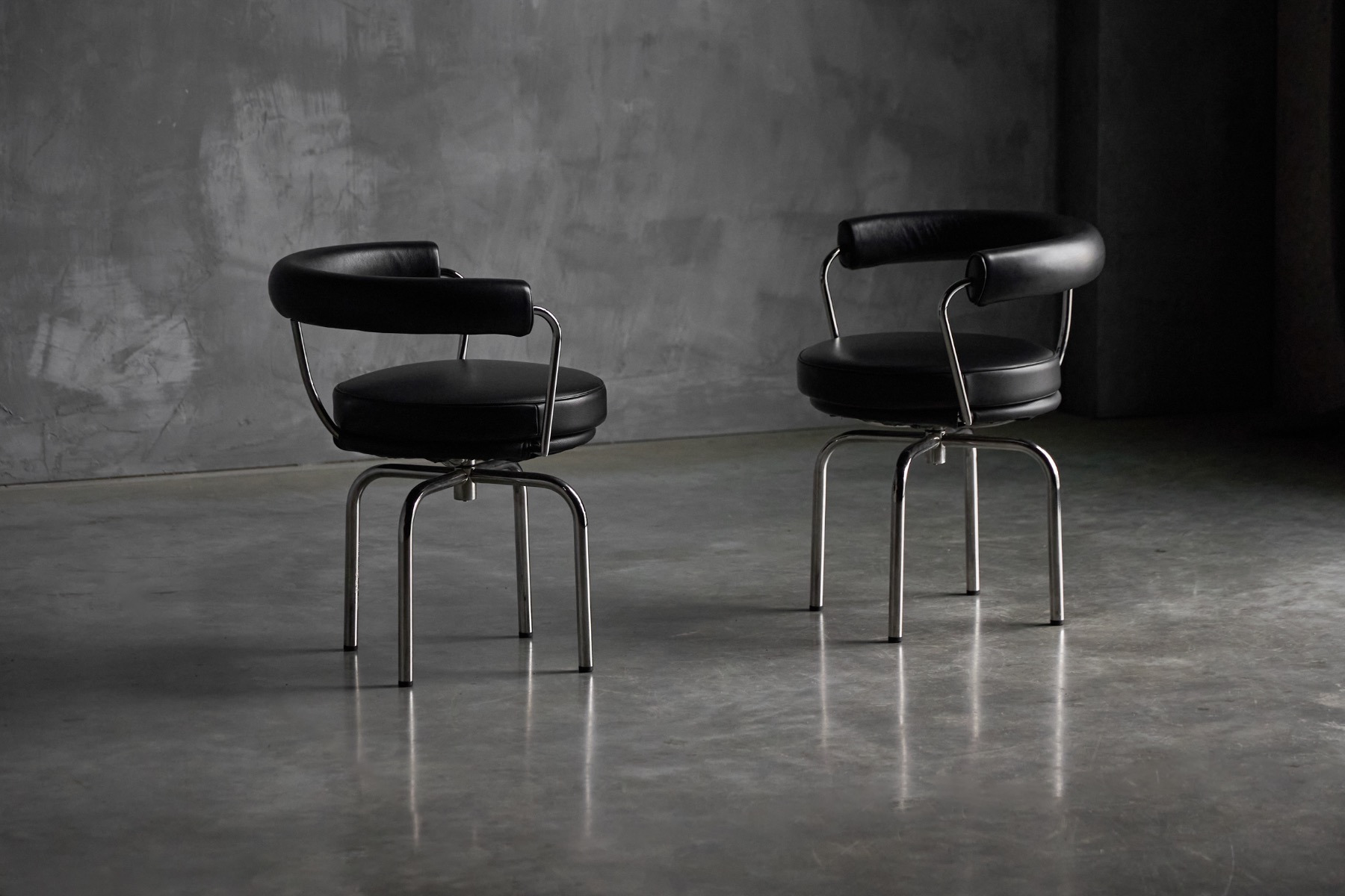 Modernist LC7 chairs from the 1980s Cassina production