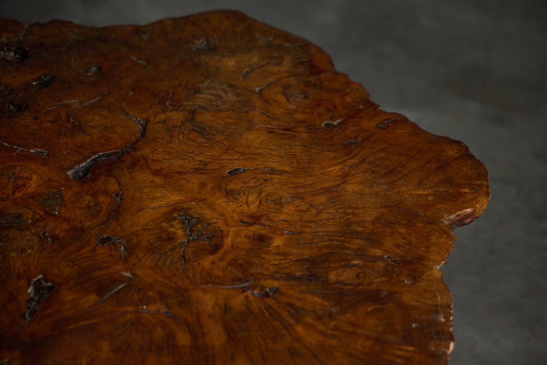 Mid century burl wood coffee table with expressive grain and natural texture 