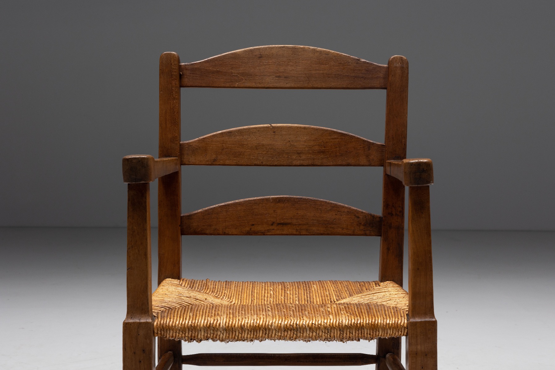 Mid century rural armchair in solid wood with straw seat