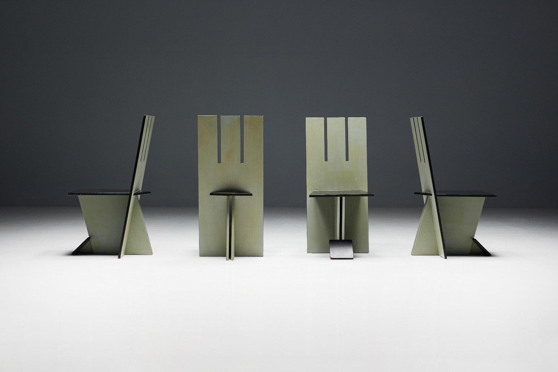 Modernist dining chairs with primary lines De Stijl influence