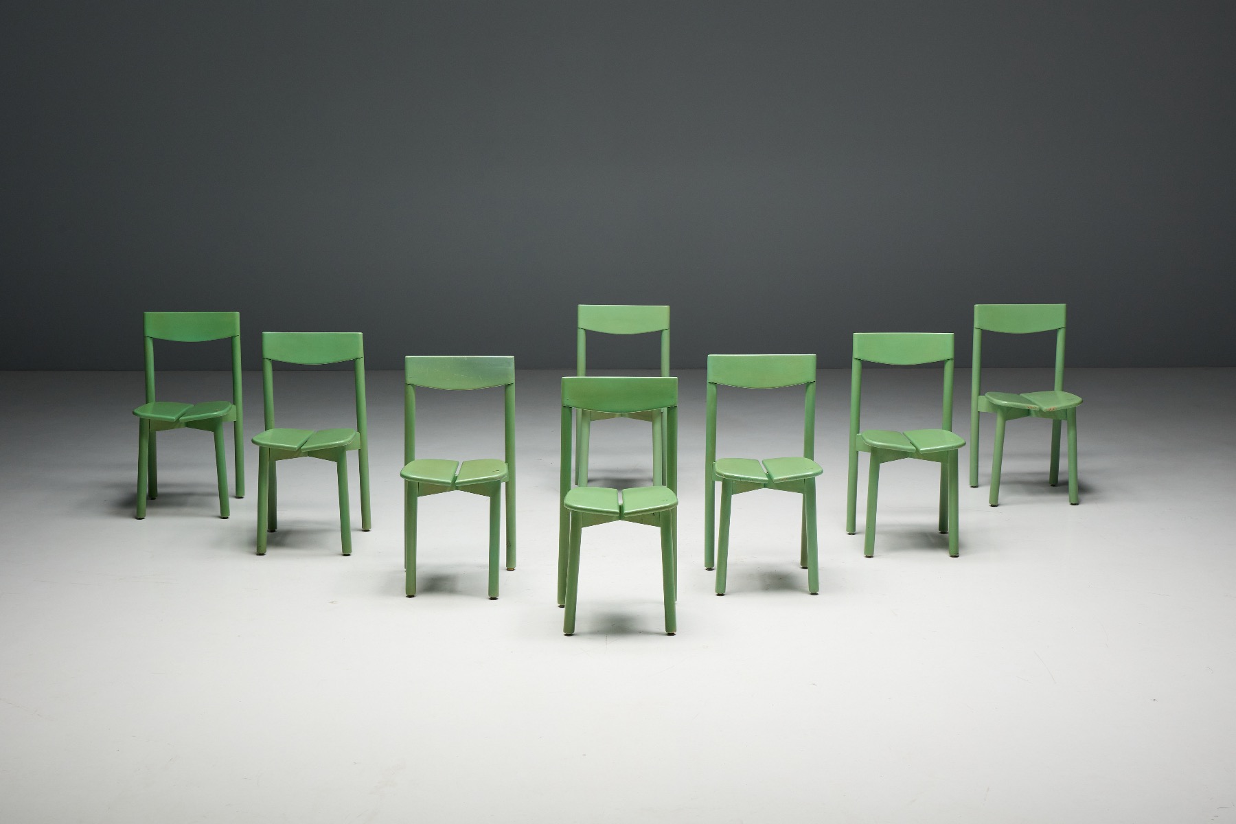 Organic green dining chair with sculptural form