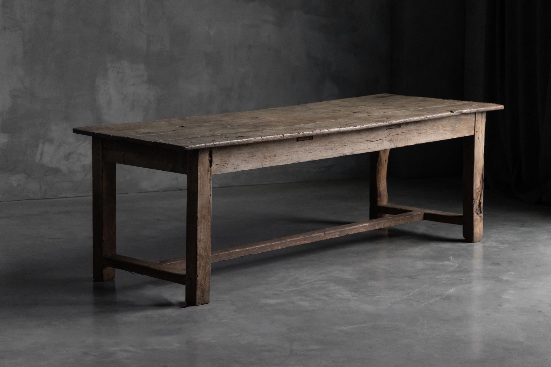 Primitive rustic farmhouse dining table with simple construction