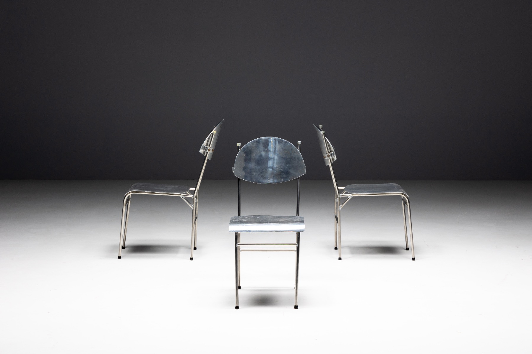 Retro aluminum dining chairs in 1980s style
