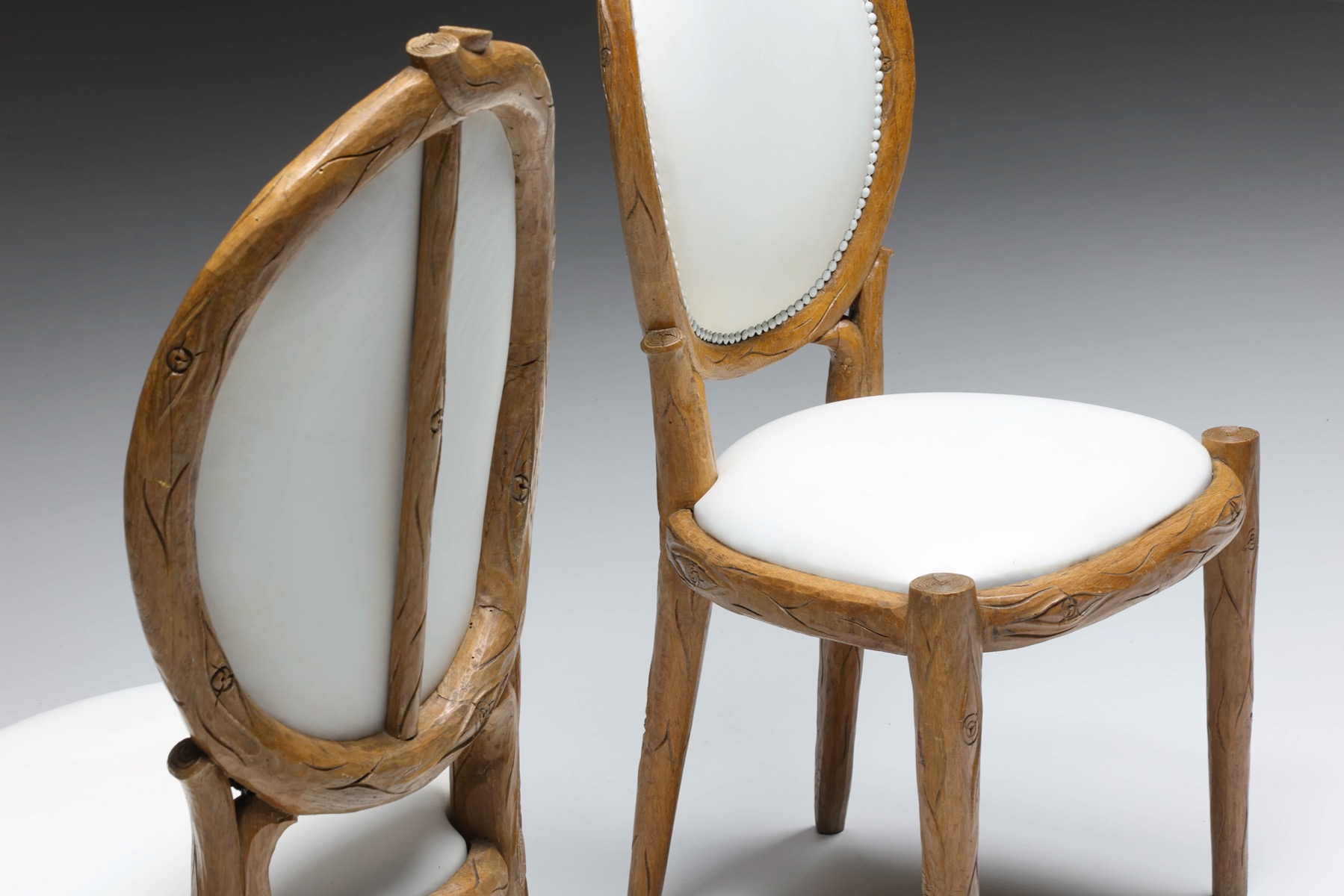 Retro dining chairs in hand carved wood from the 1960s