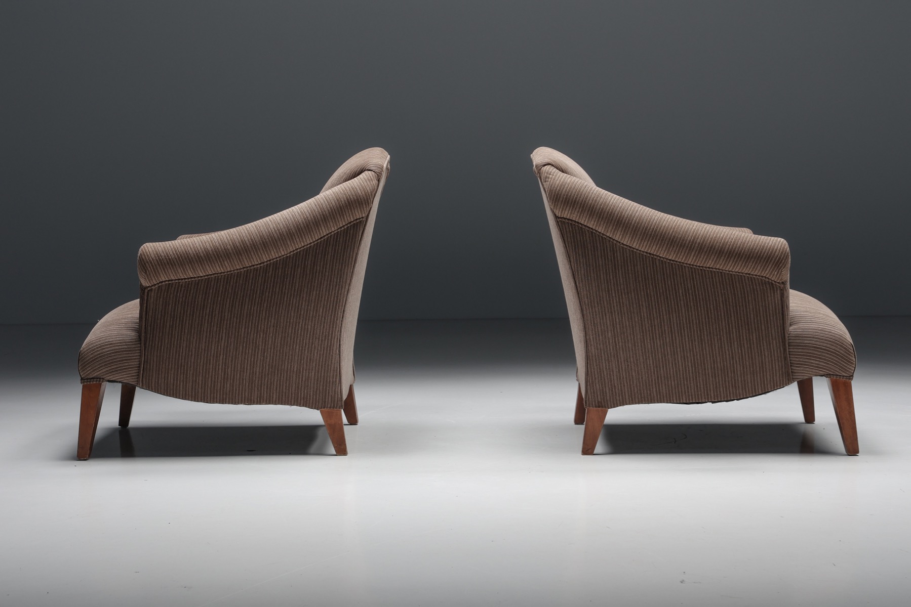Retro armchair with striped upholstery from the 1950s style