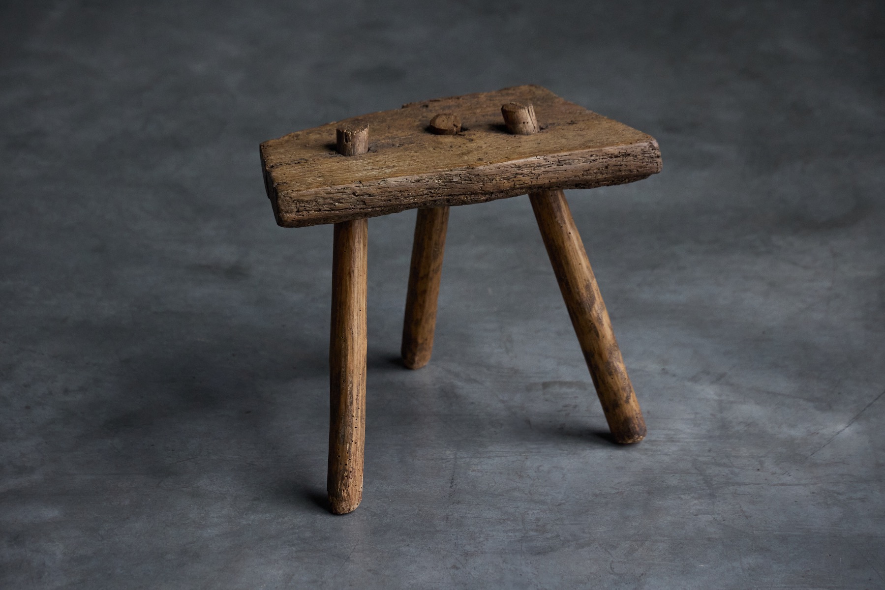 Rural handcrafted stools with timeworn character