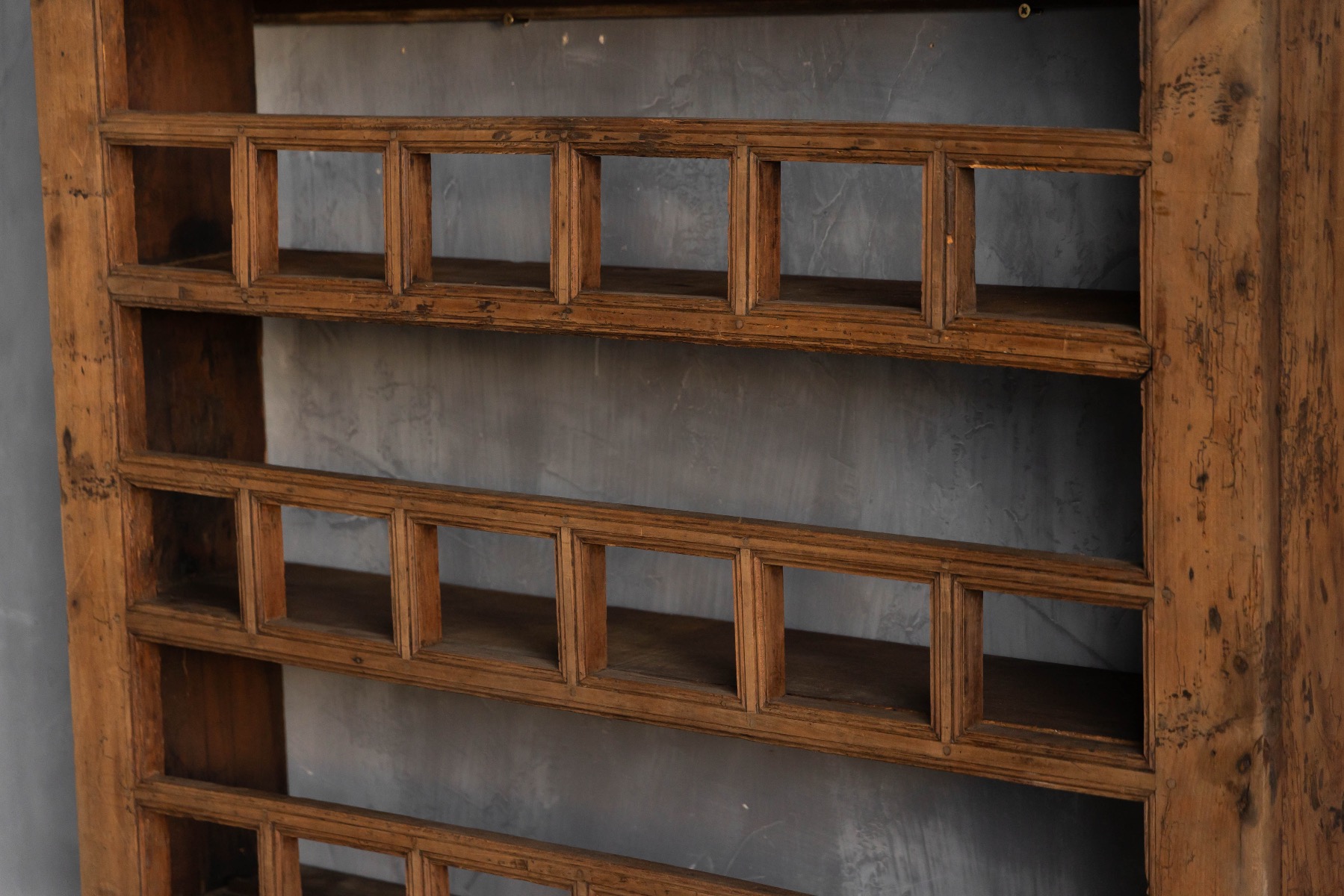 Rural vernacular wall shelf with honest utilitarian form