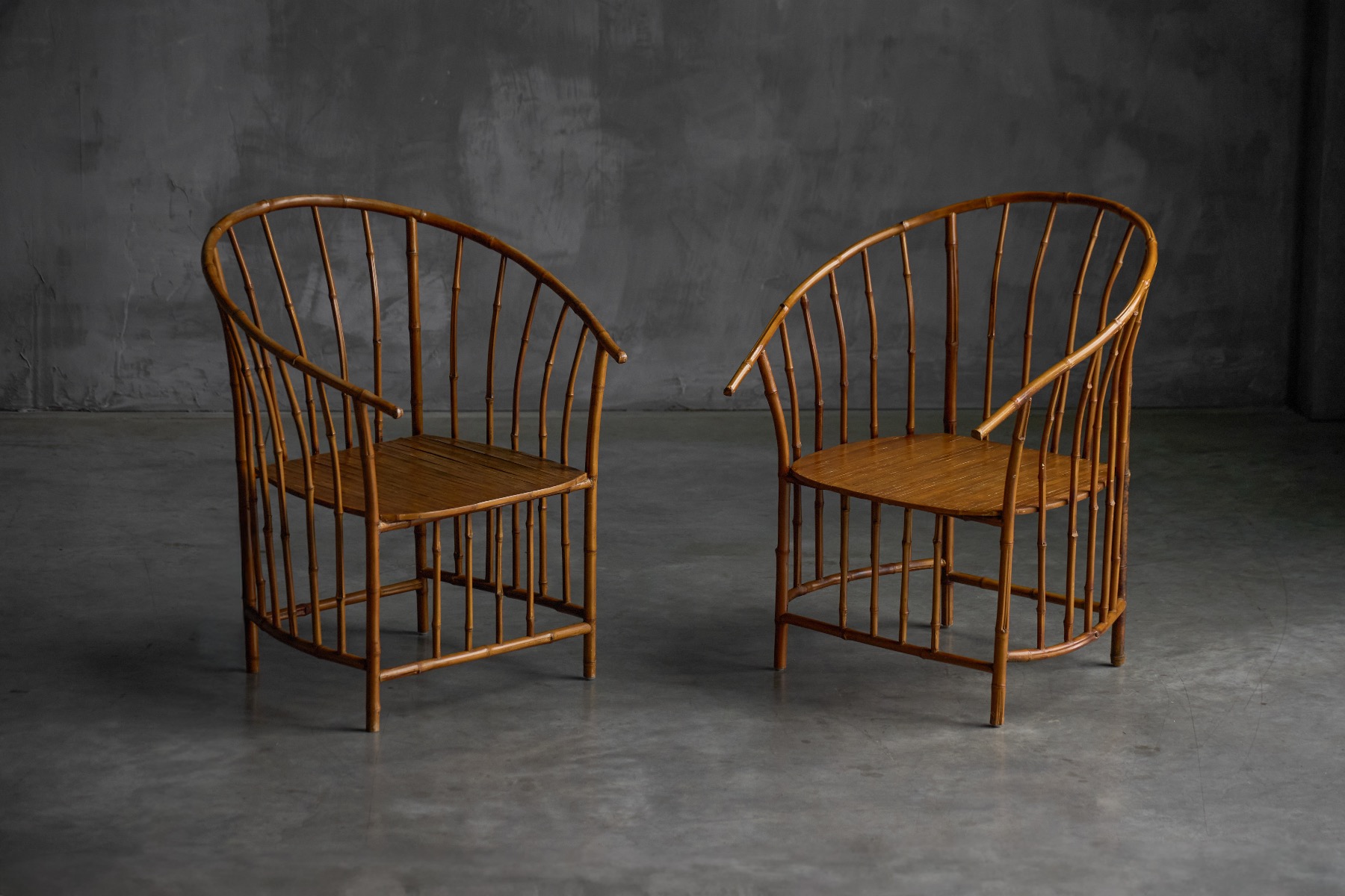 Rustic bamboo armchairs with natural texture and patina