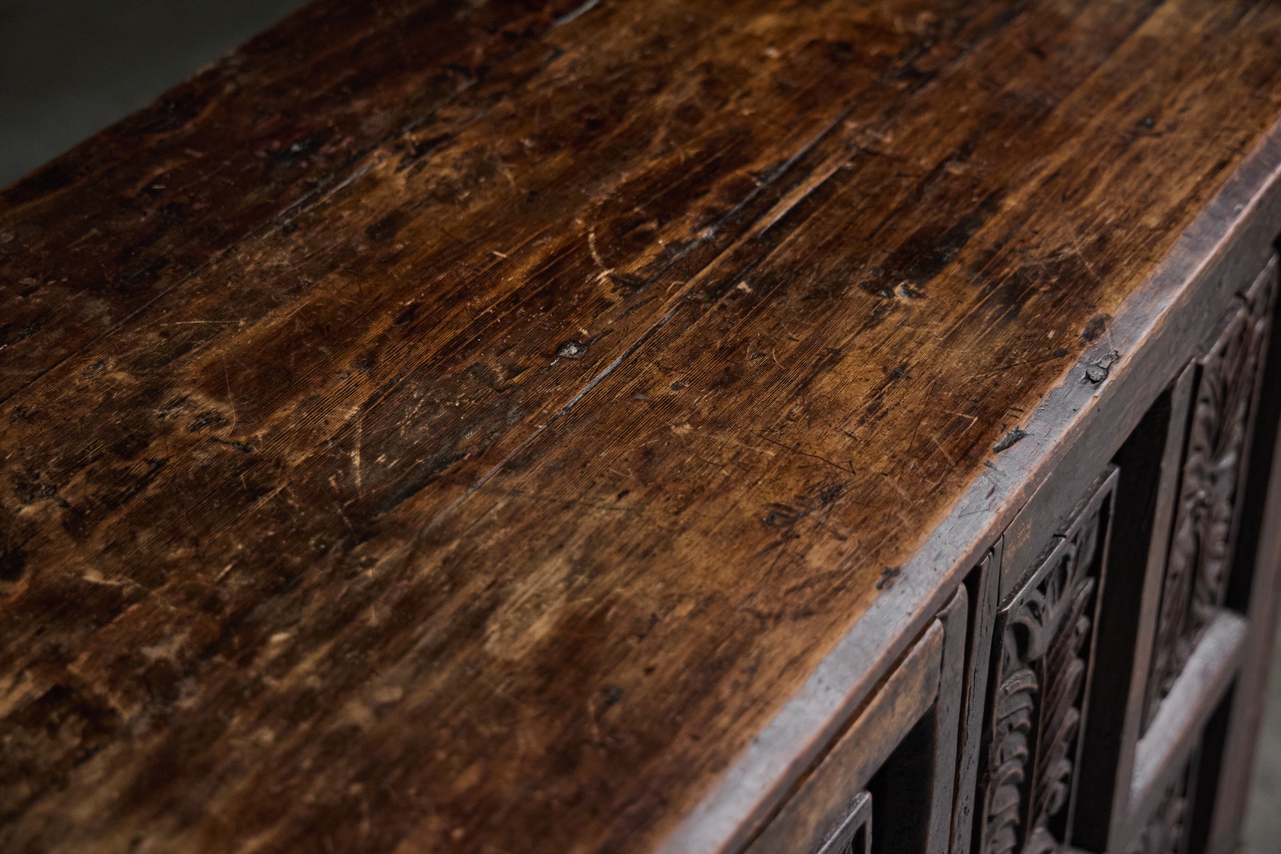 Rustic antique carved cupboard with deep aged patina