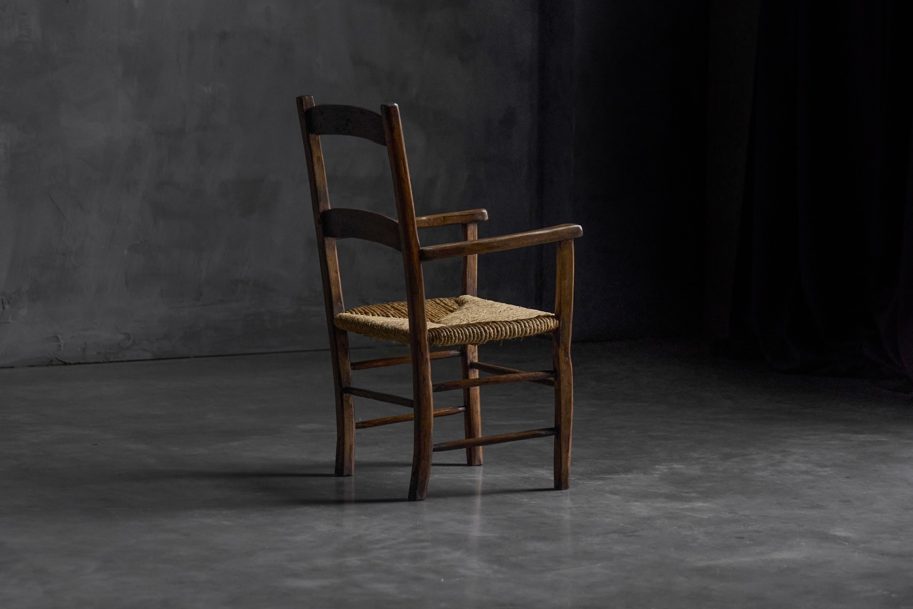 Rustic rural armchair with honest utilitarian form