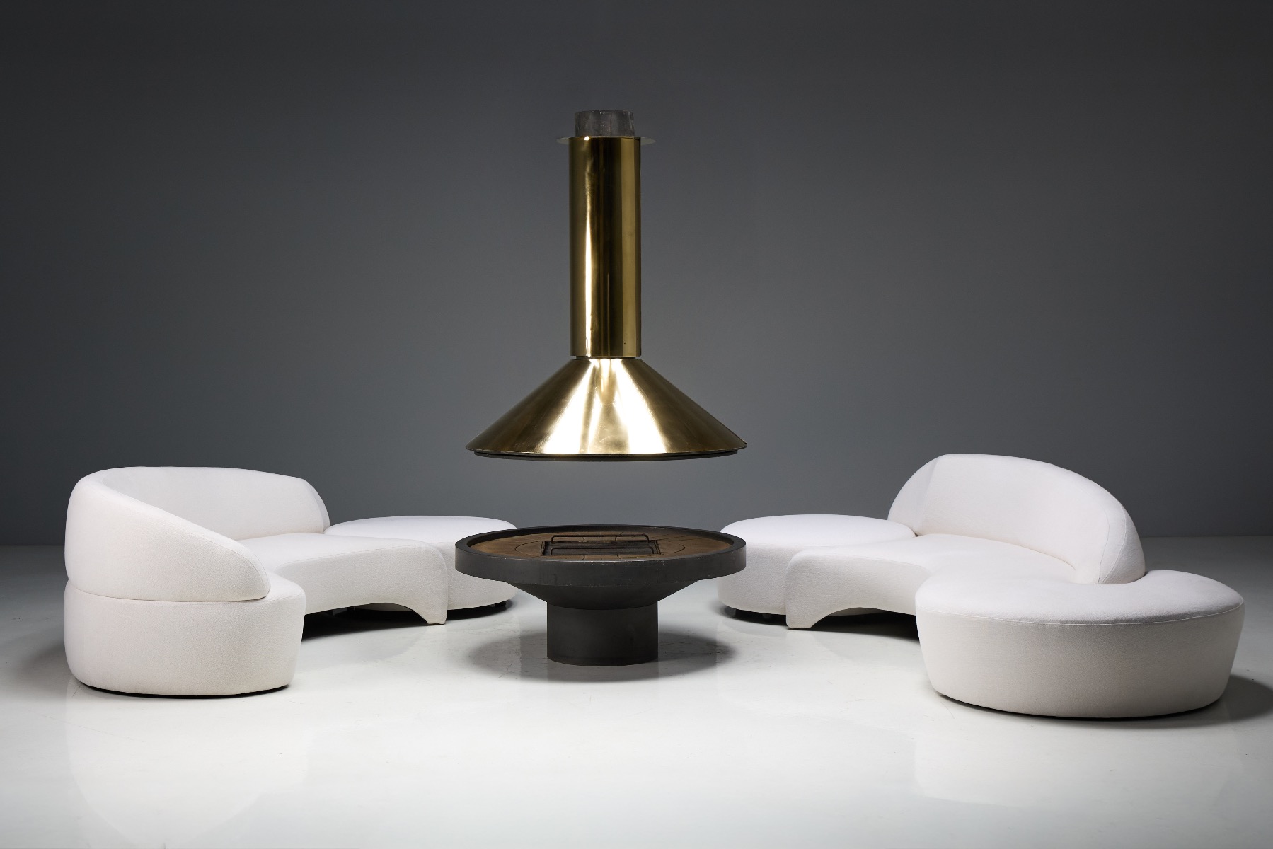 Sculptural mid century brass fireplace with strong presence