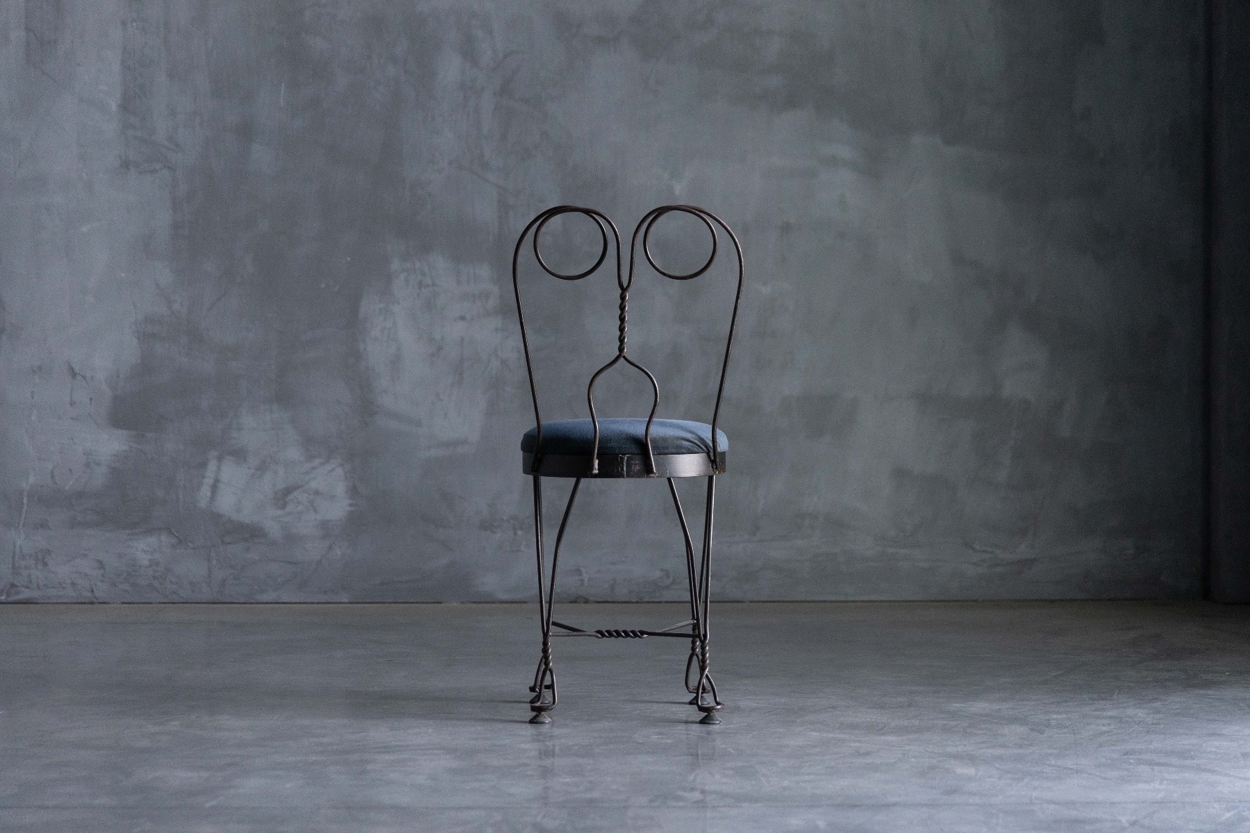 Sculptural butterfly dining chair dating to the 1960s