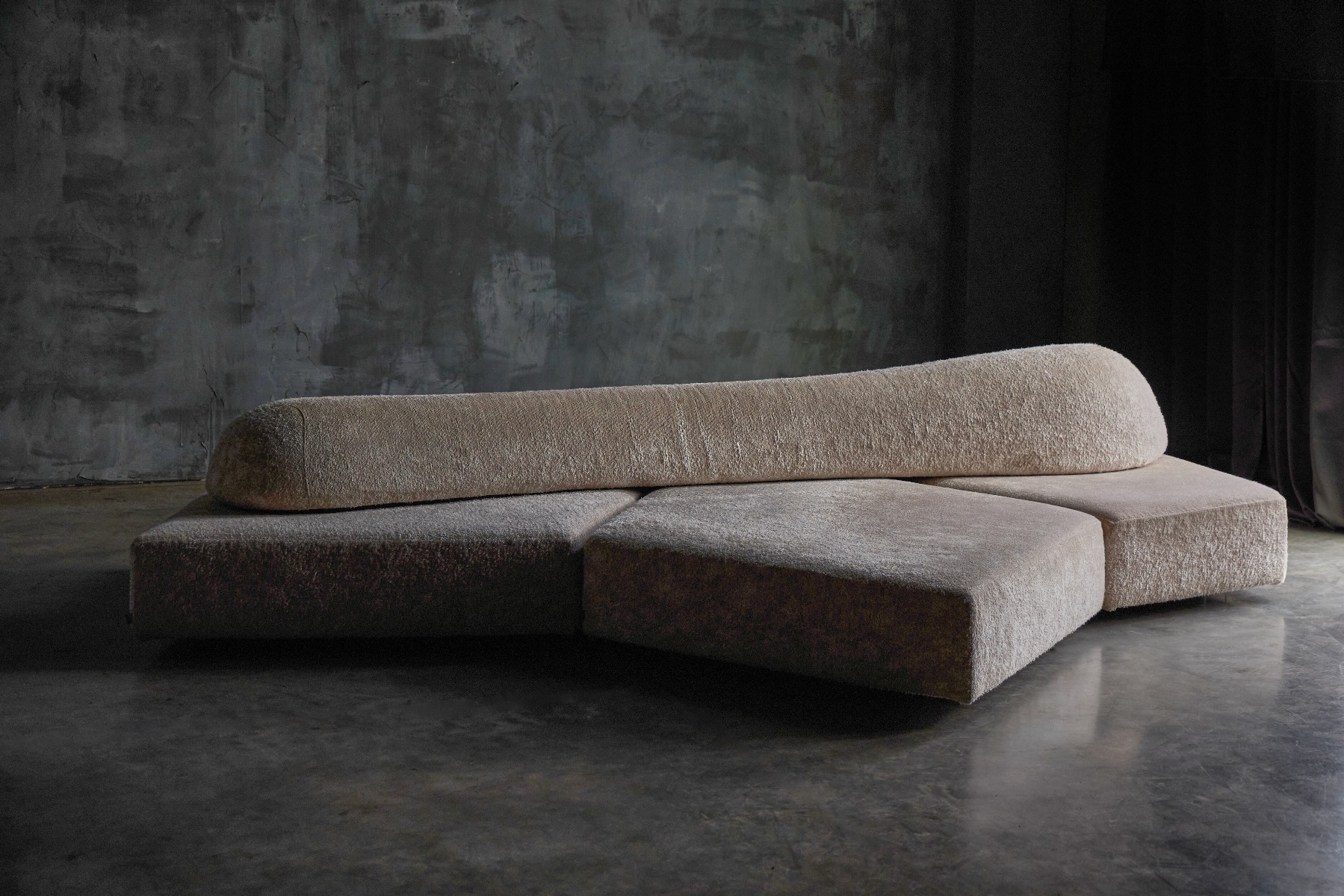 Organic form design sofa from the On the Rocks series