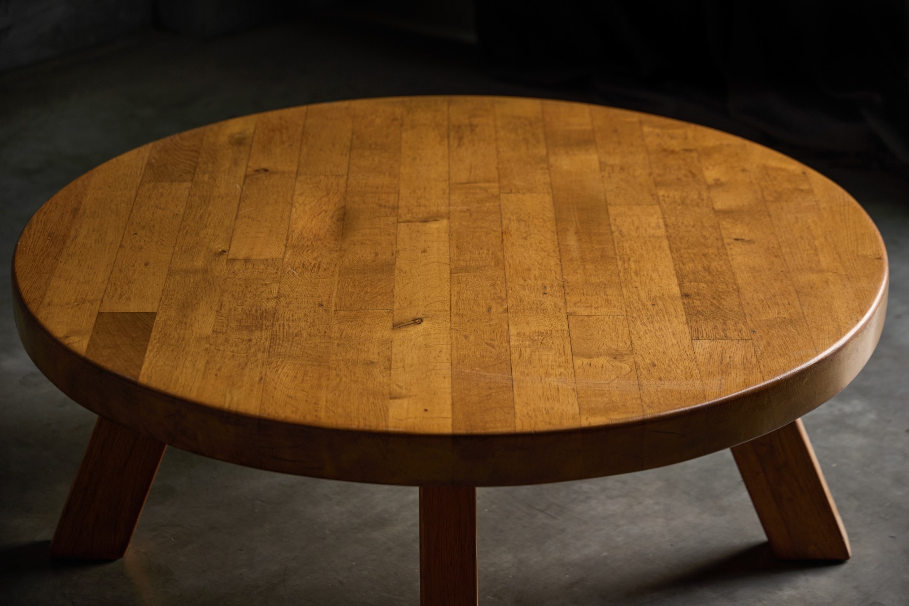 Solid wood round coffee table in brutalist style