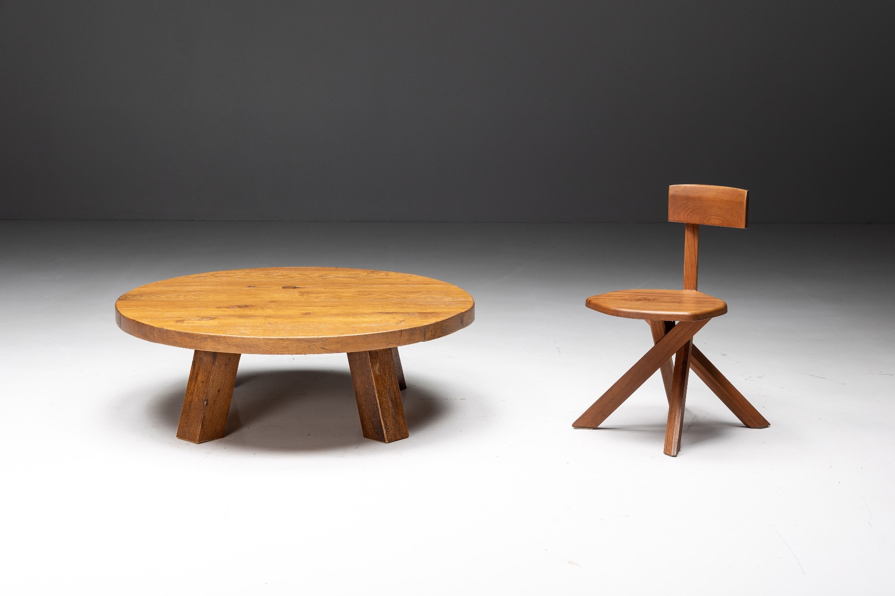 Solid wood round coffee table in brutalist style
