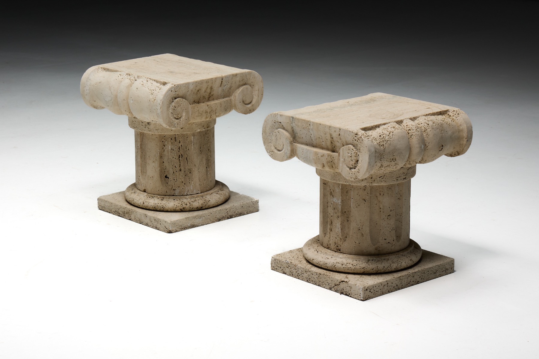 Travertine stone side table with architectural presence and monumental weight  
