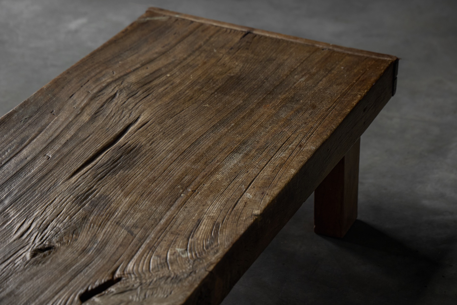 Vernacular low farmhouse table with simple rural construction