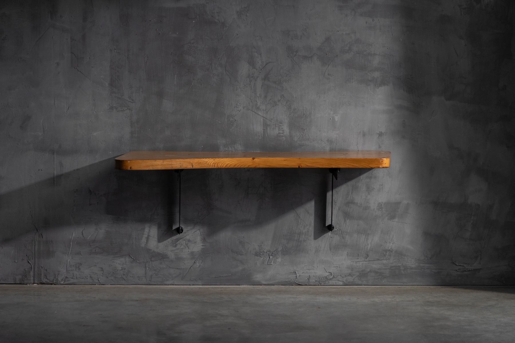 Sculptural wooden console table with single cylindrical support by Charlotte Perrian