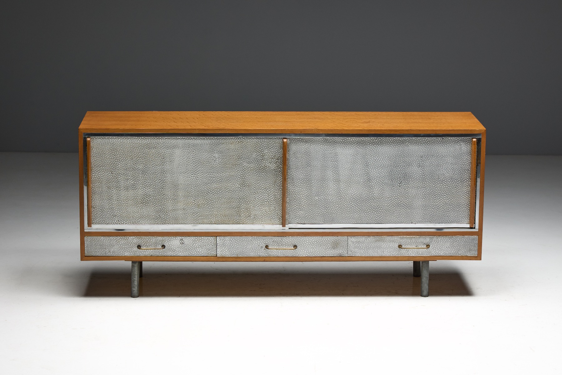 Architectural mid century modern sideboard with metal facade