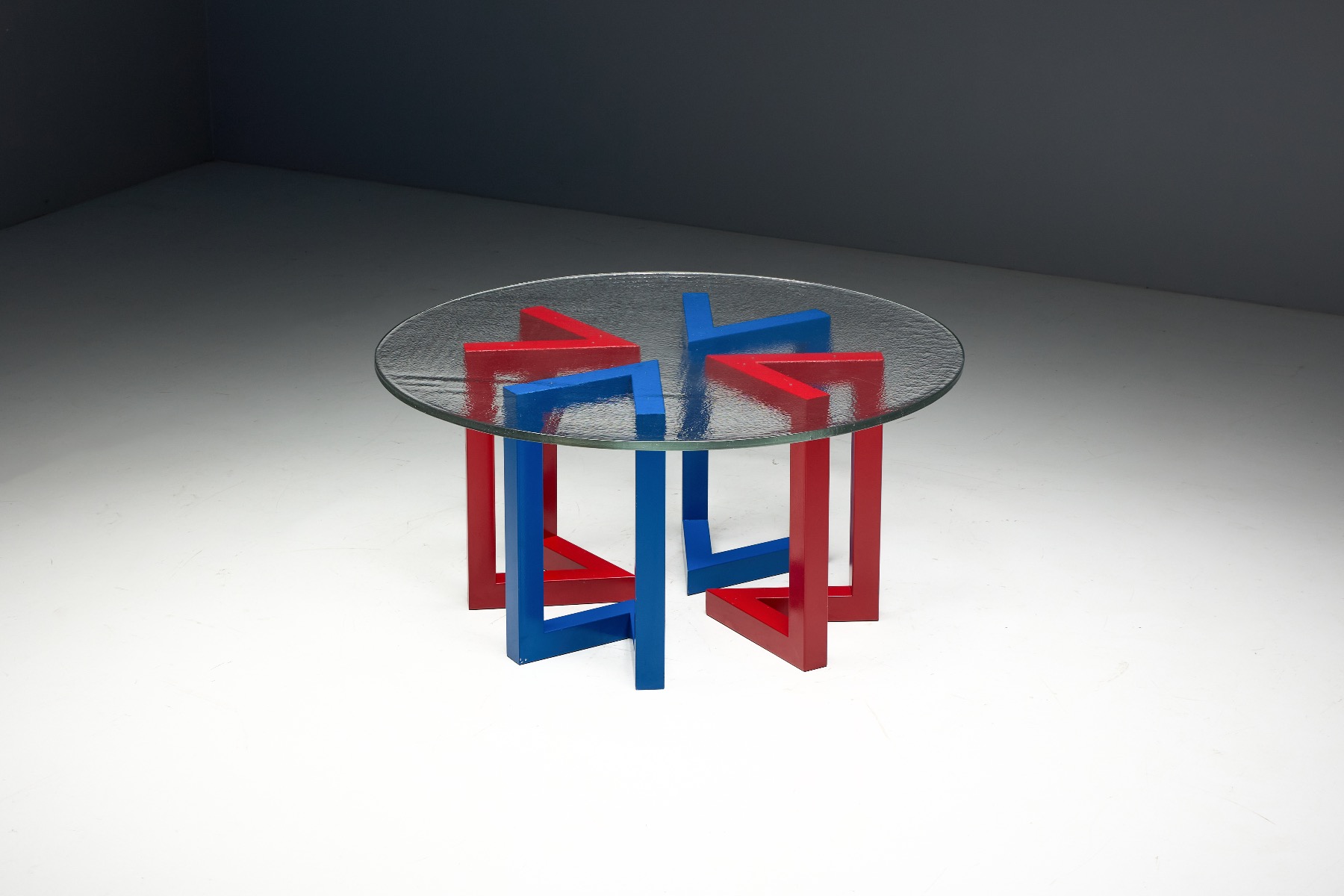 Geometric postmodern table with glass top