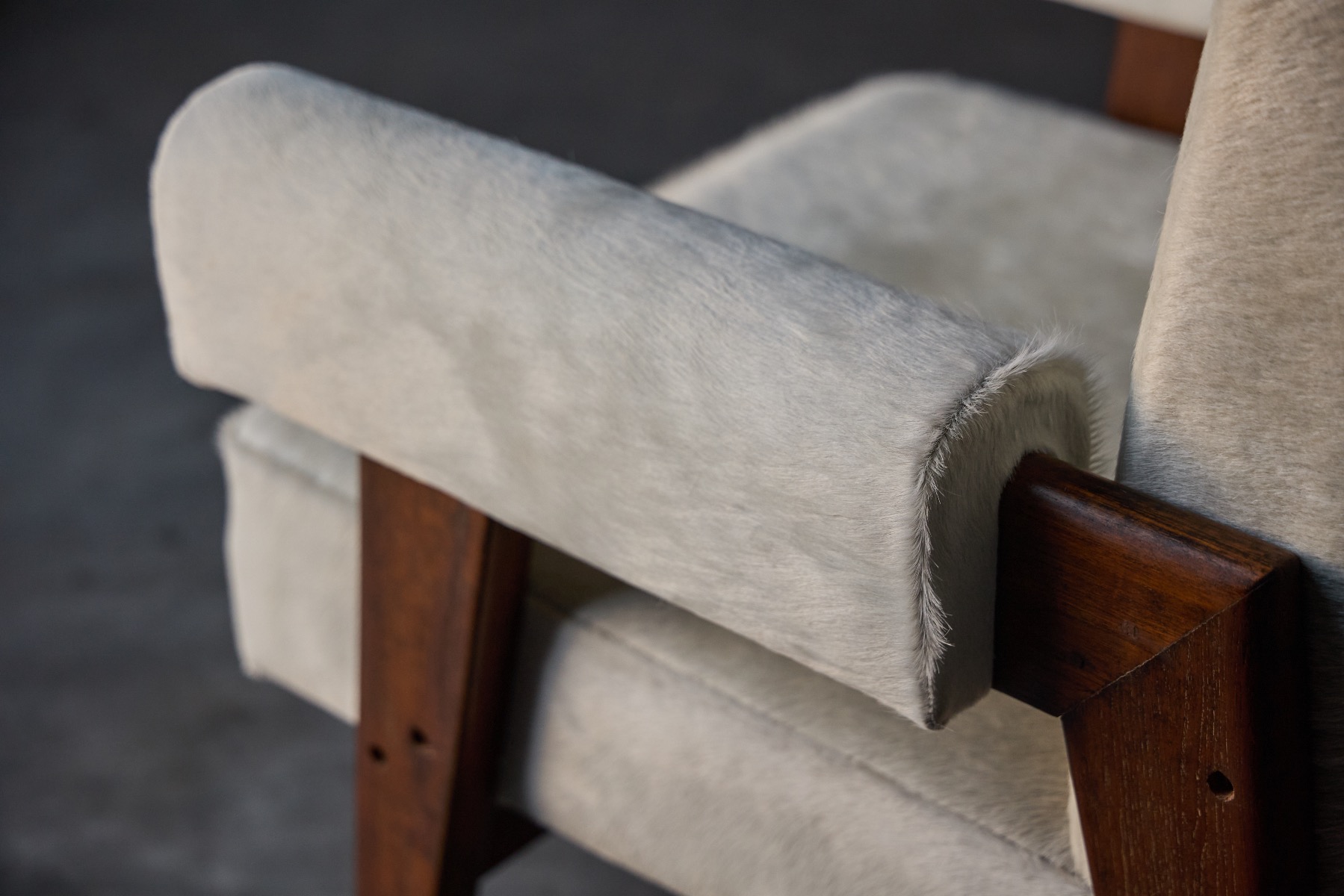 Mid century architectural bridge armchair design