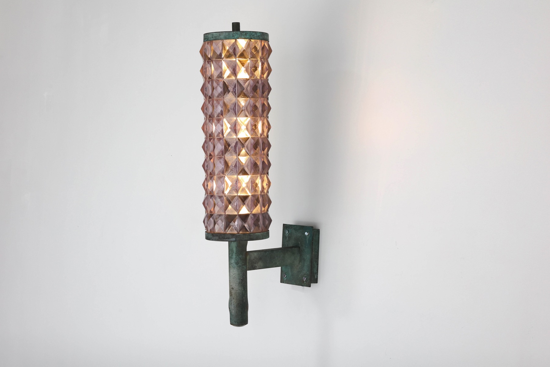 Collectible art deco wall sconces in iron and glass