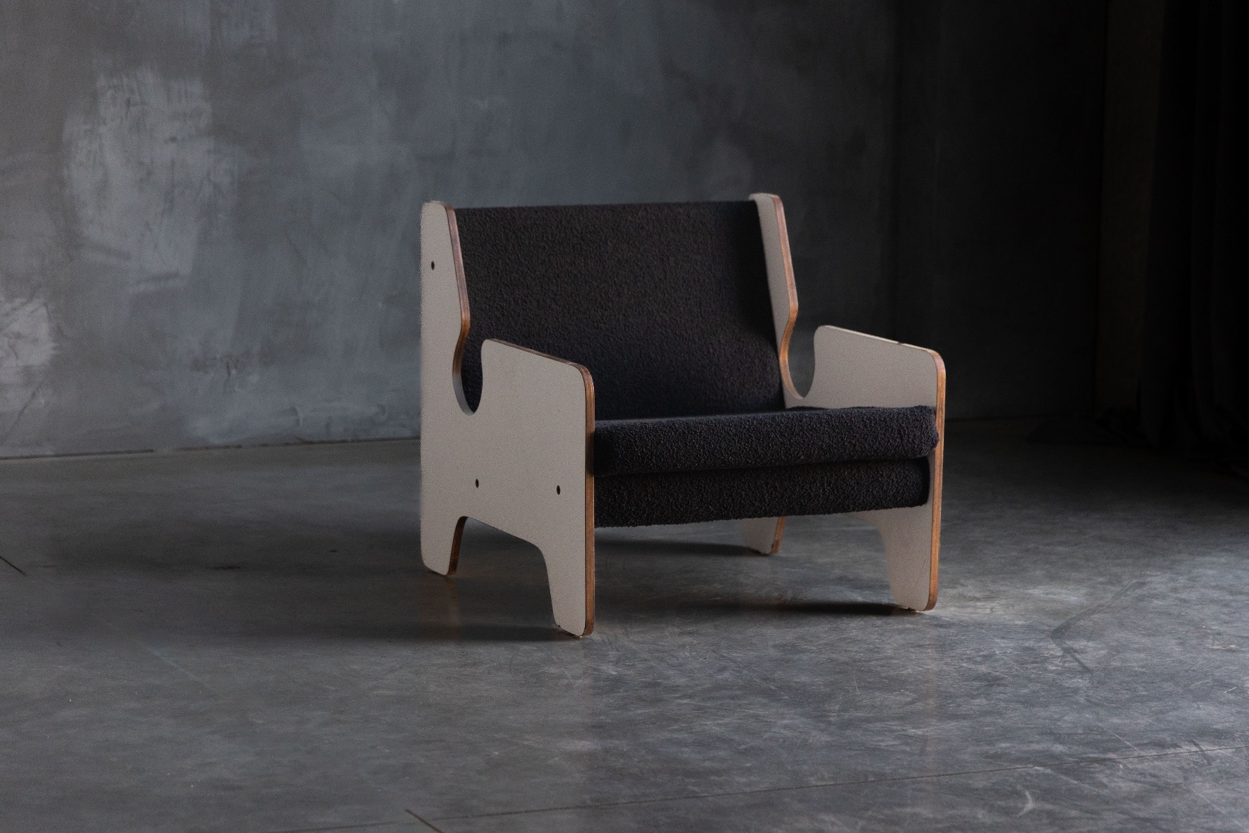 Collectible postmodern lounge chair in black and white Italian design
