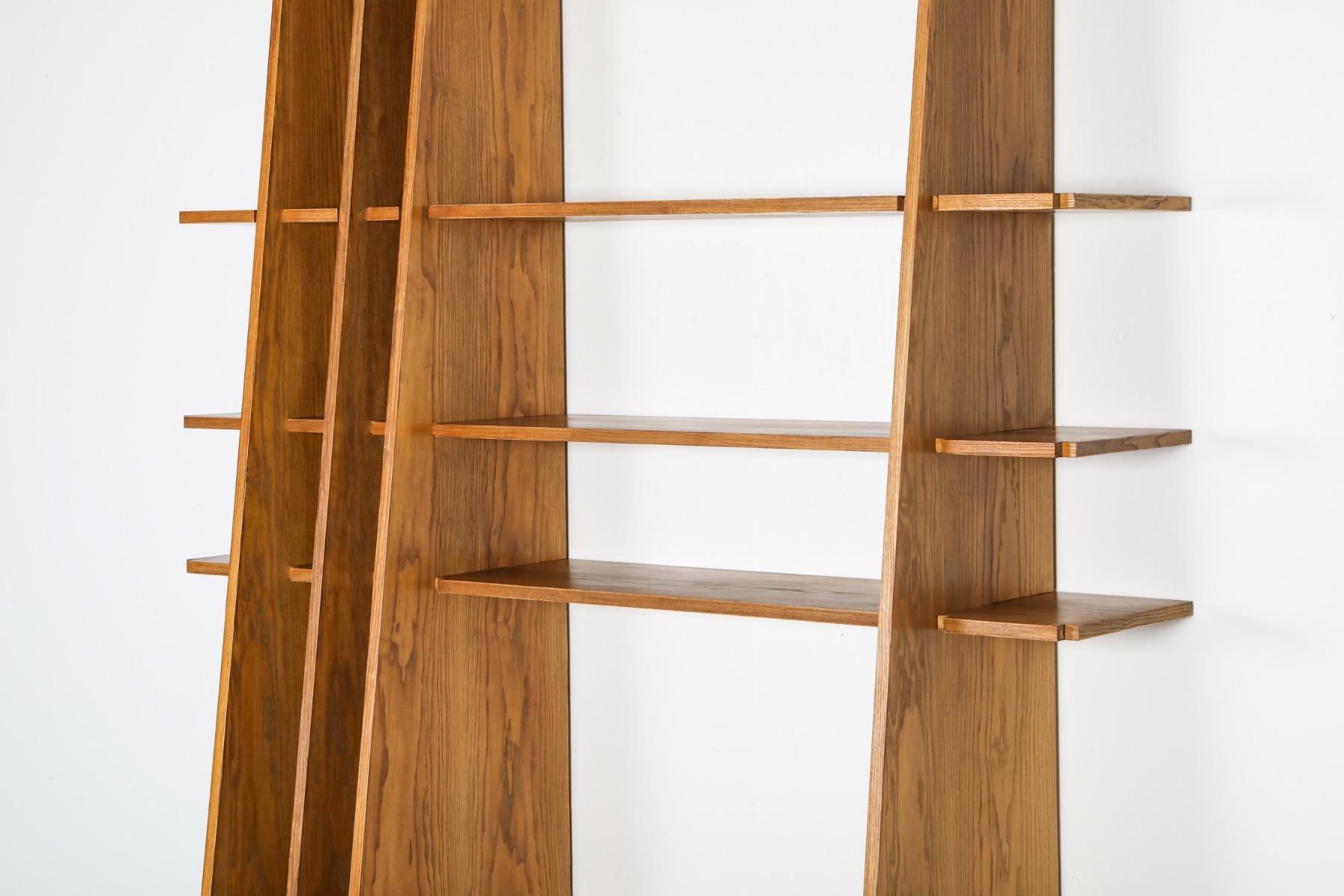 Collectible Italian walnut shelving unit from the 1980s