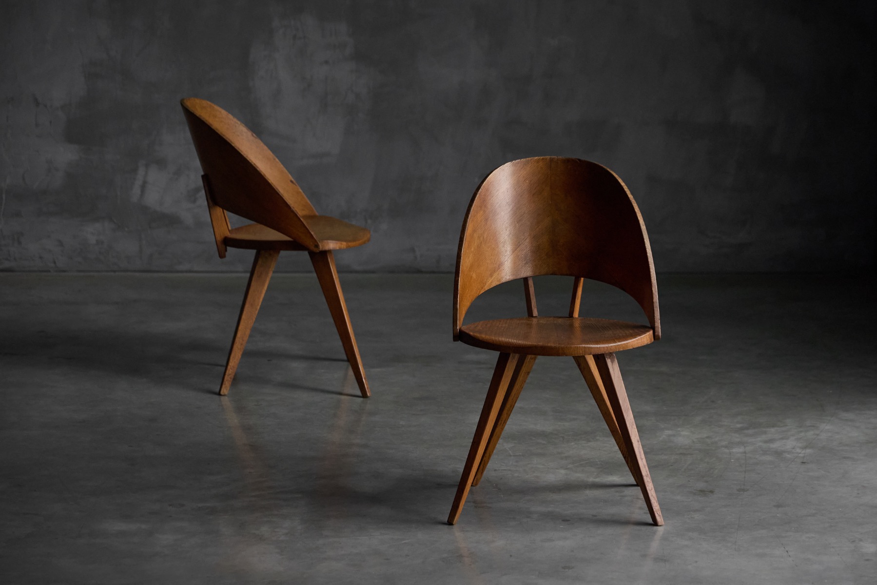 Early Italian plywood dining chairs with lightweight construction