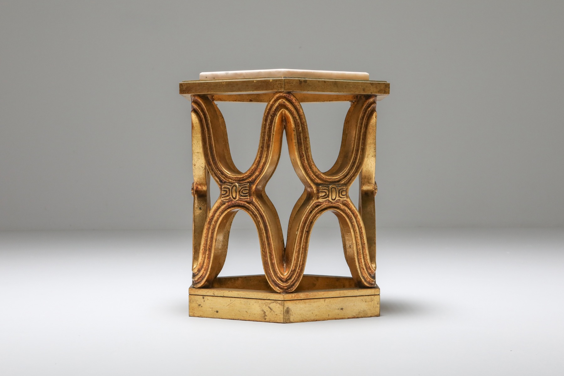 Designer carved giltwood side tables from the 1970s