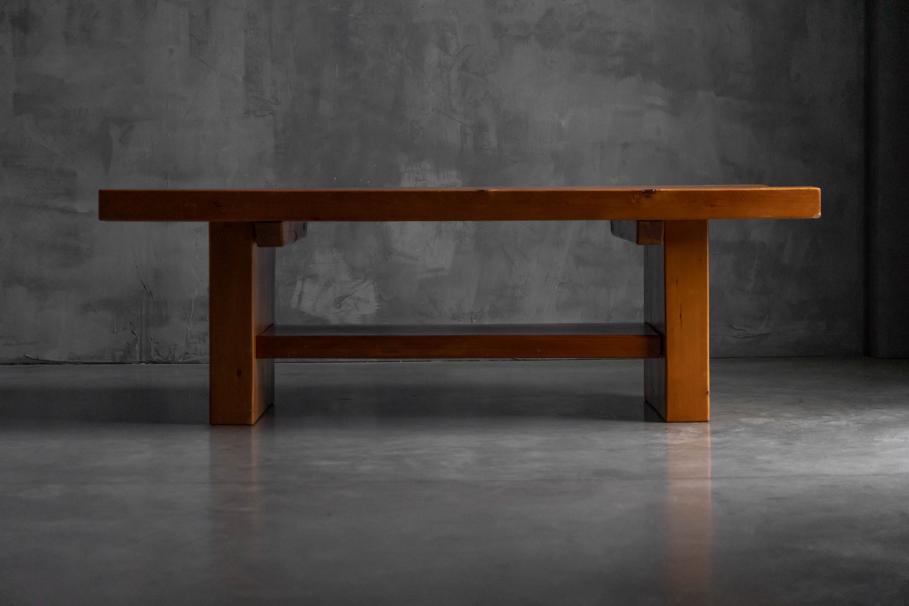 Solid elmwood dining table inspired by alpine furniture traditions