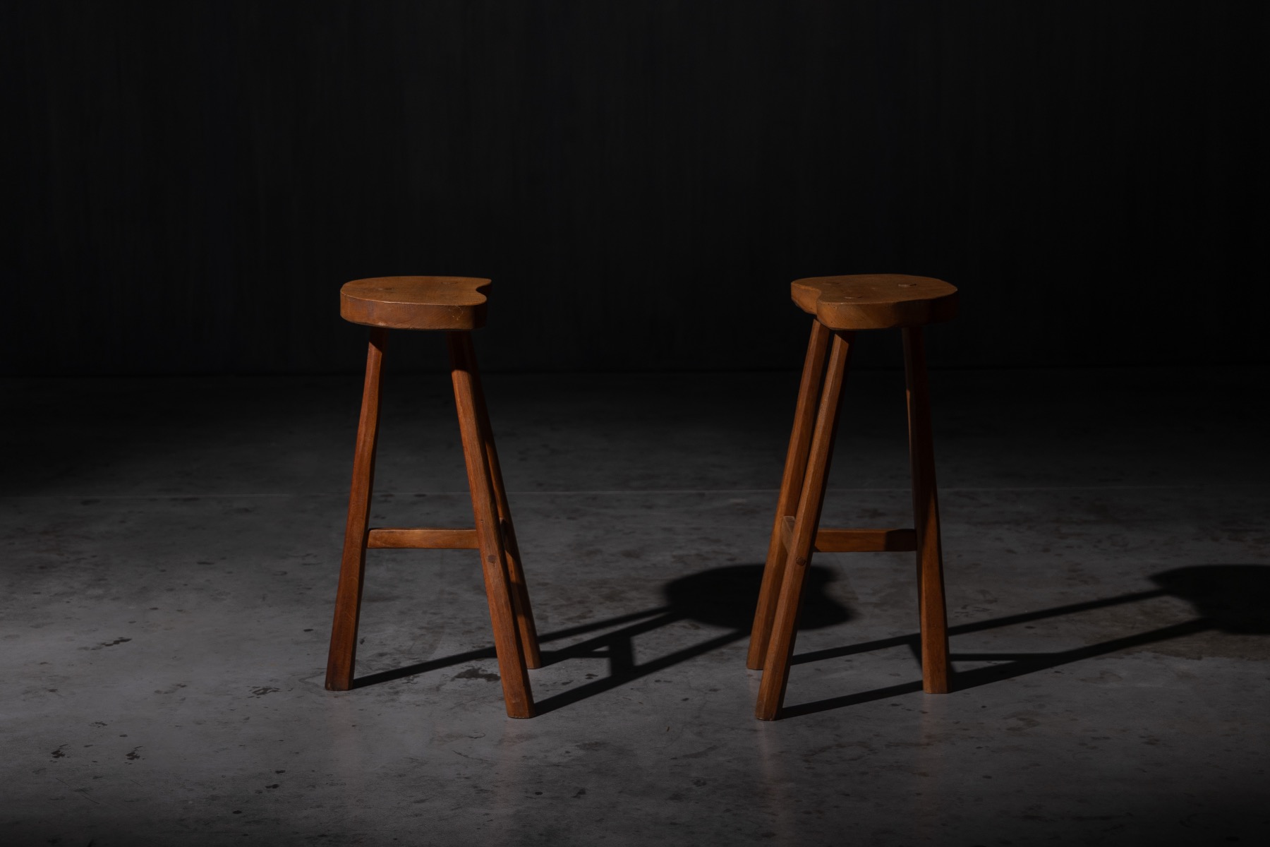 Timeworn rustic bar stools with expressive grain