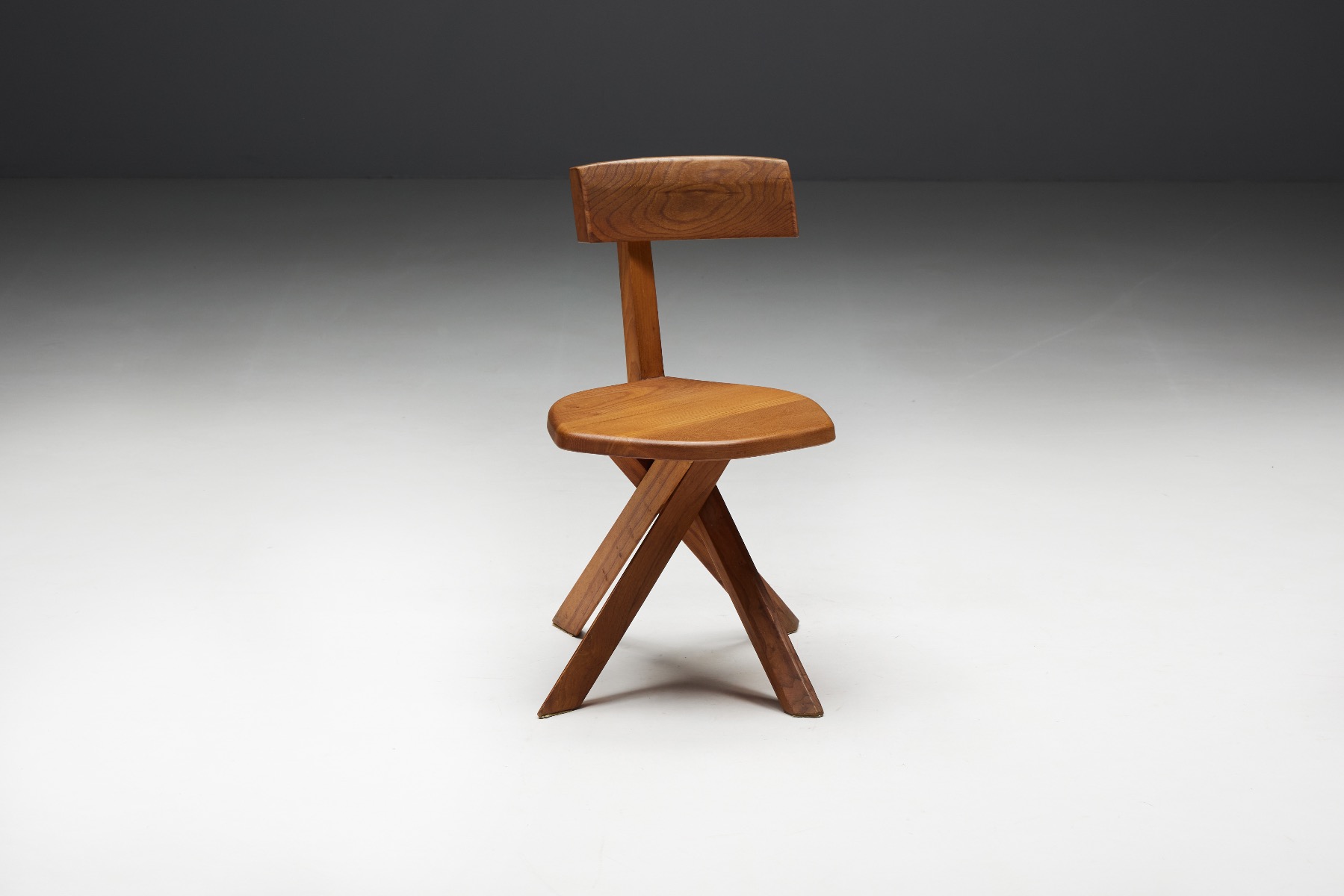 Handcrafted S34 dining chairs by Pierre Chapo in solid wood
