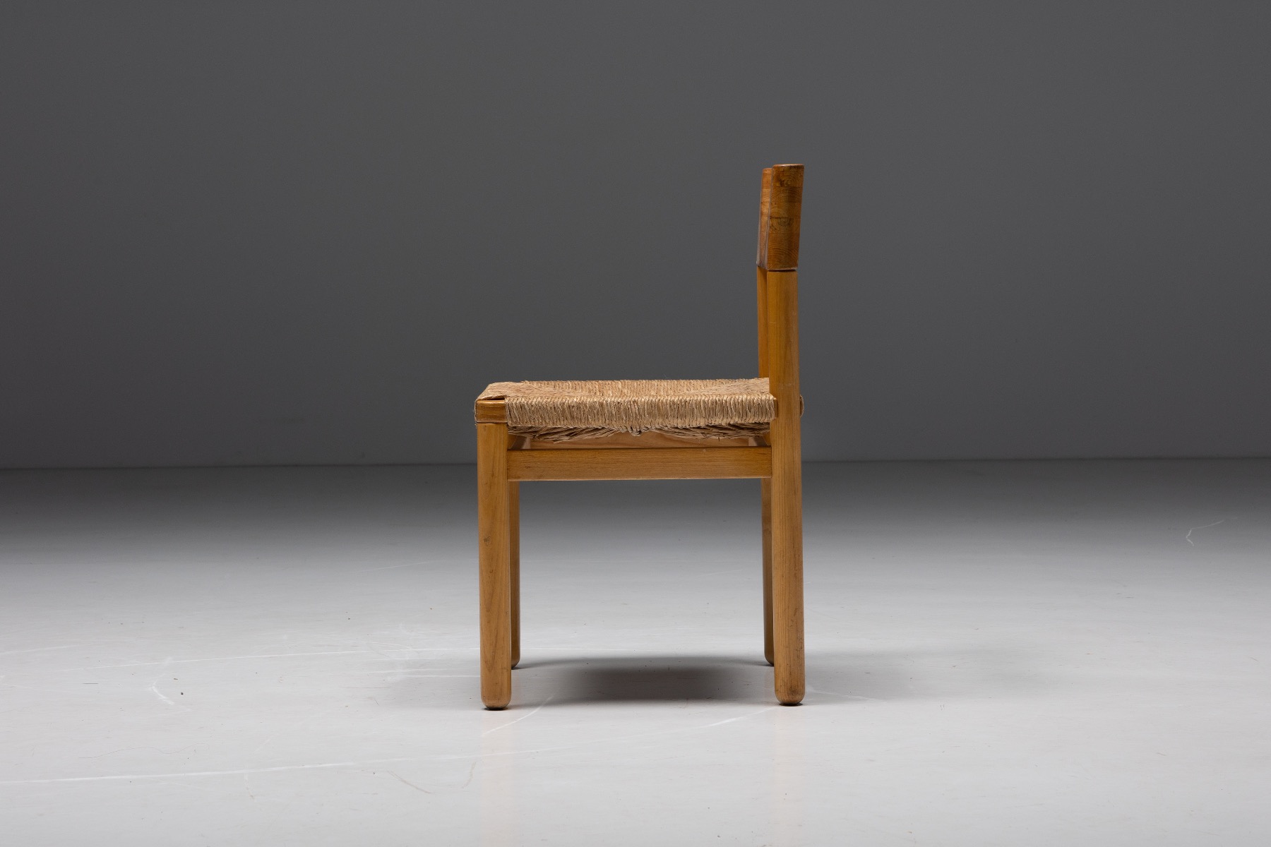 Handcrafted pine dining chairs in mid century style
