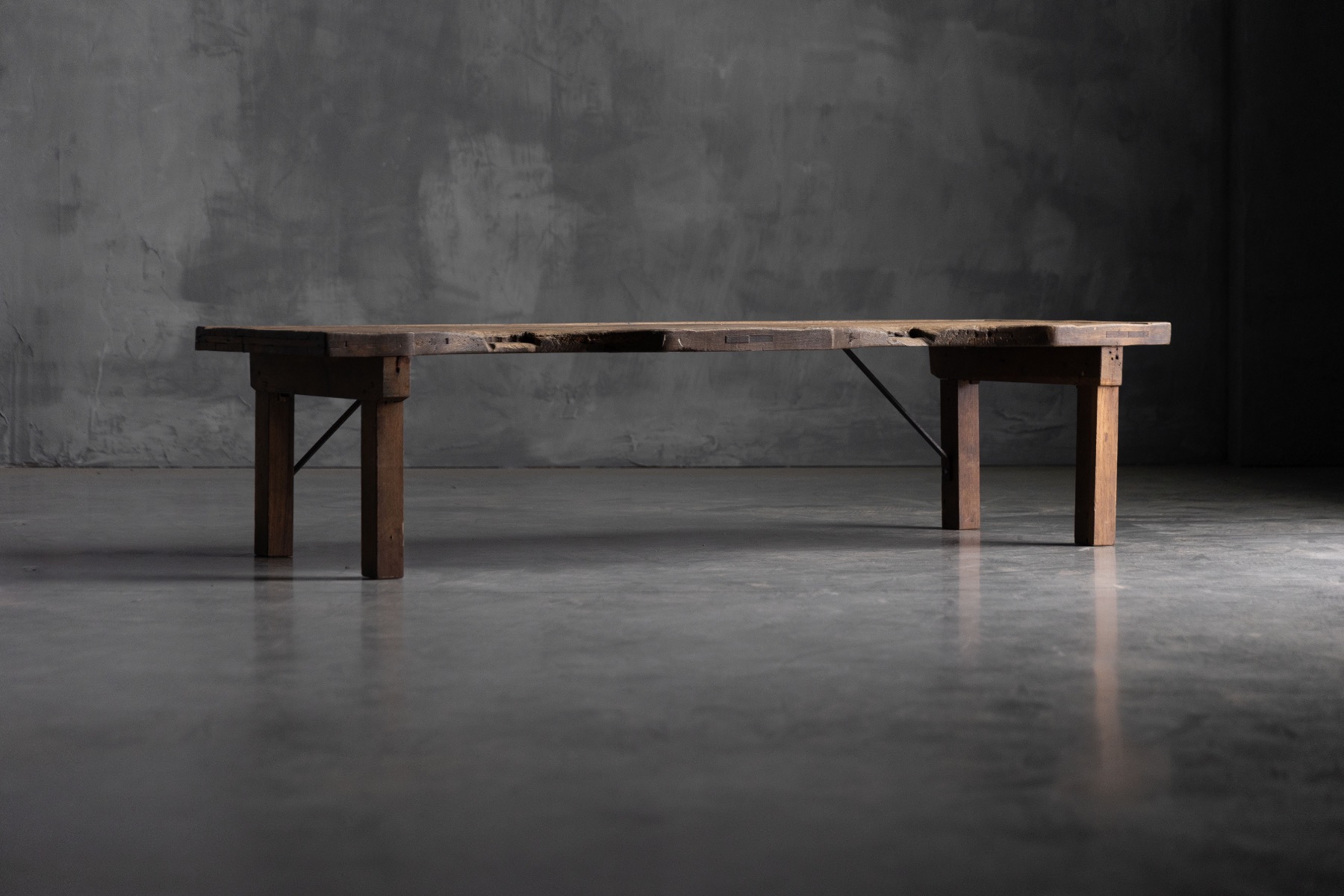 Historic jeweller table reflecting traditional workshop use