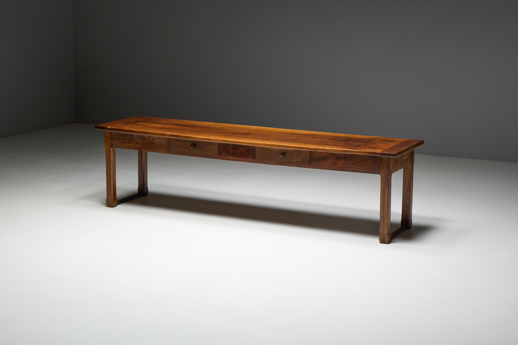 Long wooden farmhouse table with antique character