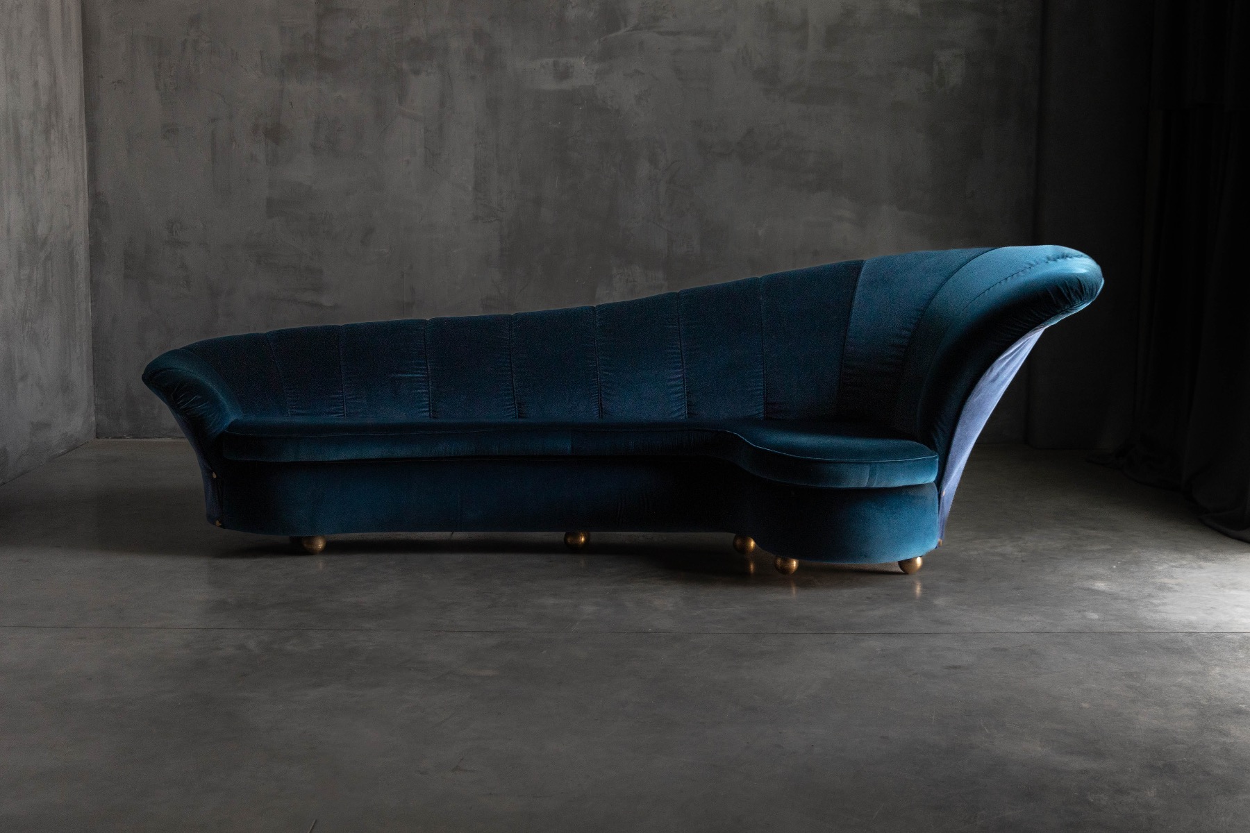 Luxury Hollywood Regency sofa featuring rich velvet fabric