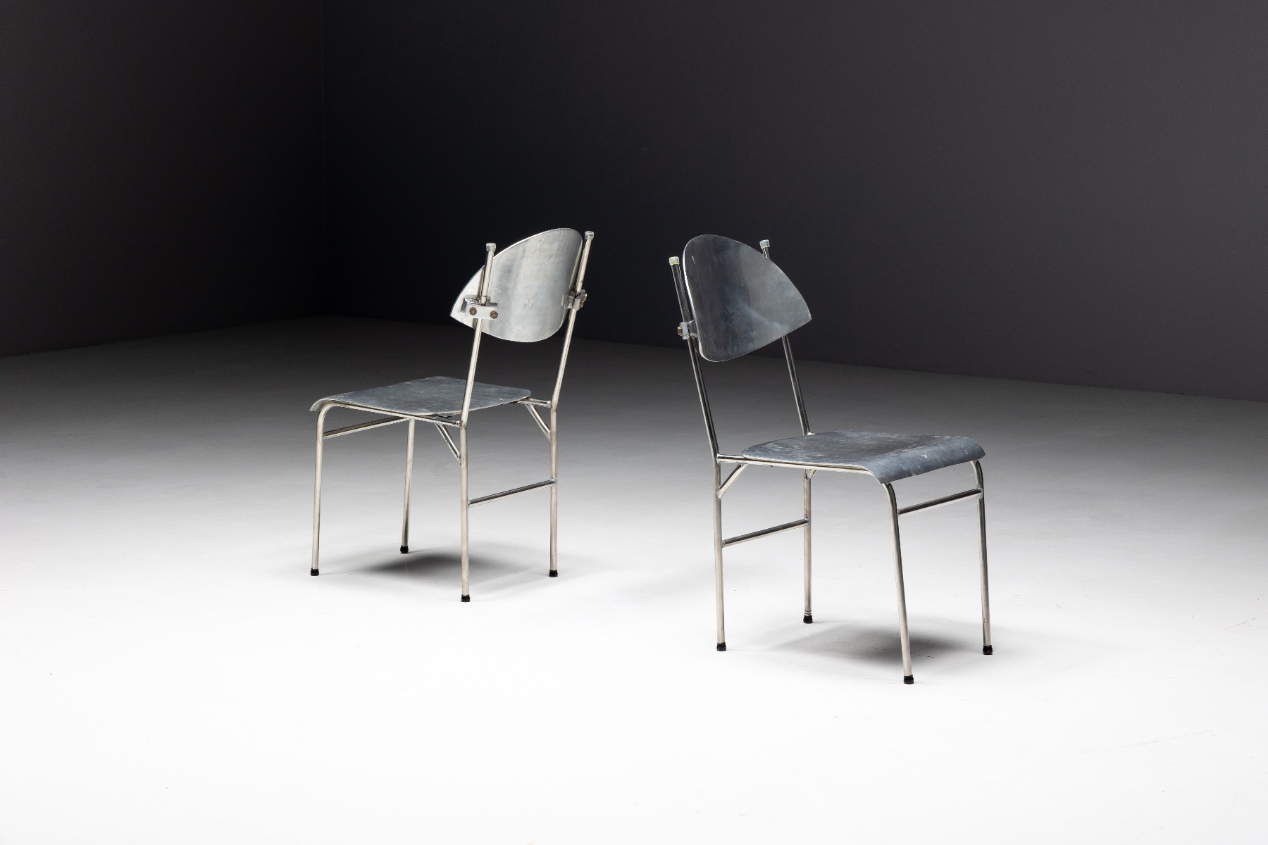 Mid century inspired aluminum chairs in postmodern design