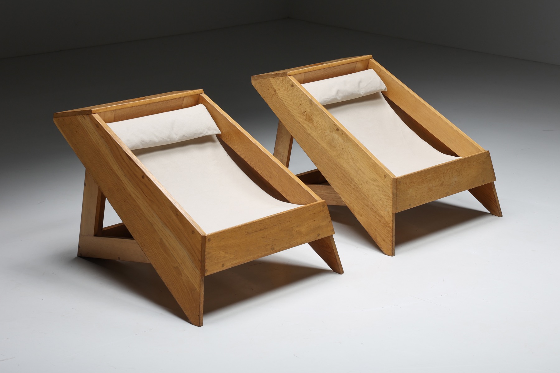 Minimalist mid century wooden lounge chairs