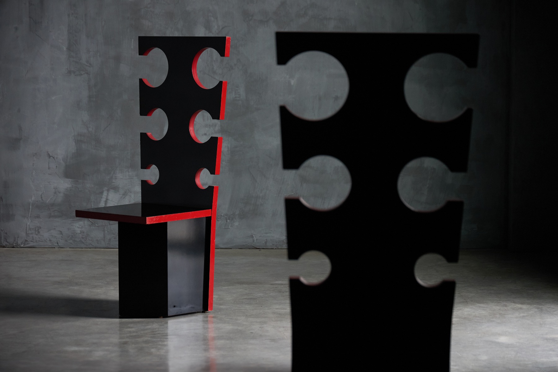 Architectural 1970s lounge chairs with bold silhouette