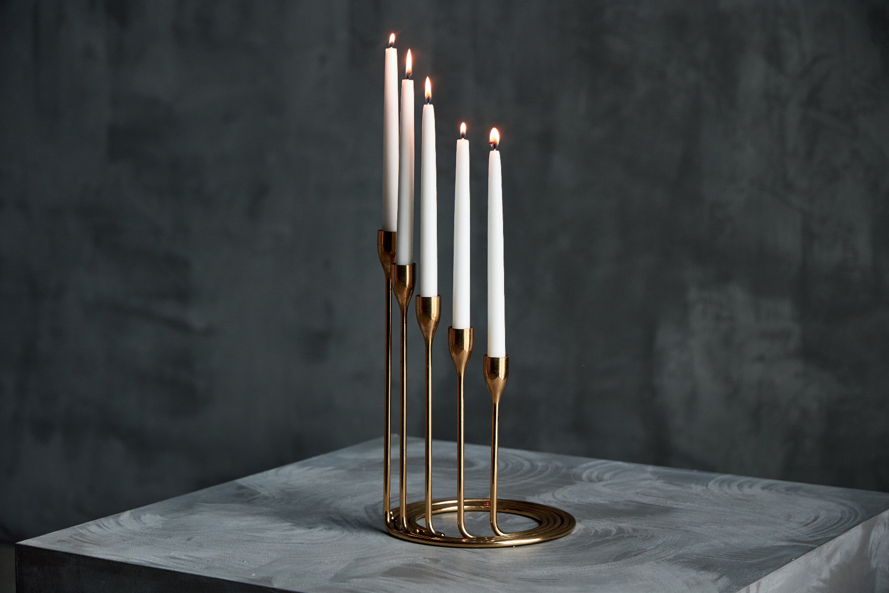 Polished brass candle holder set
