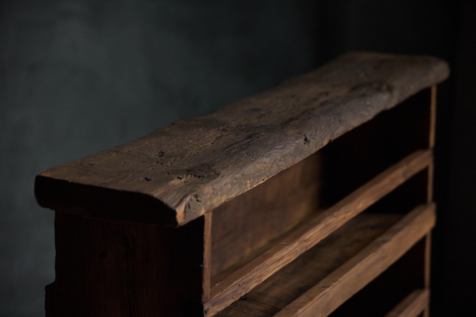 Primitive country bookcase in aged wood