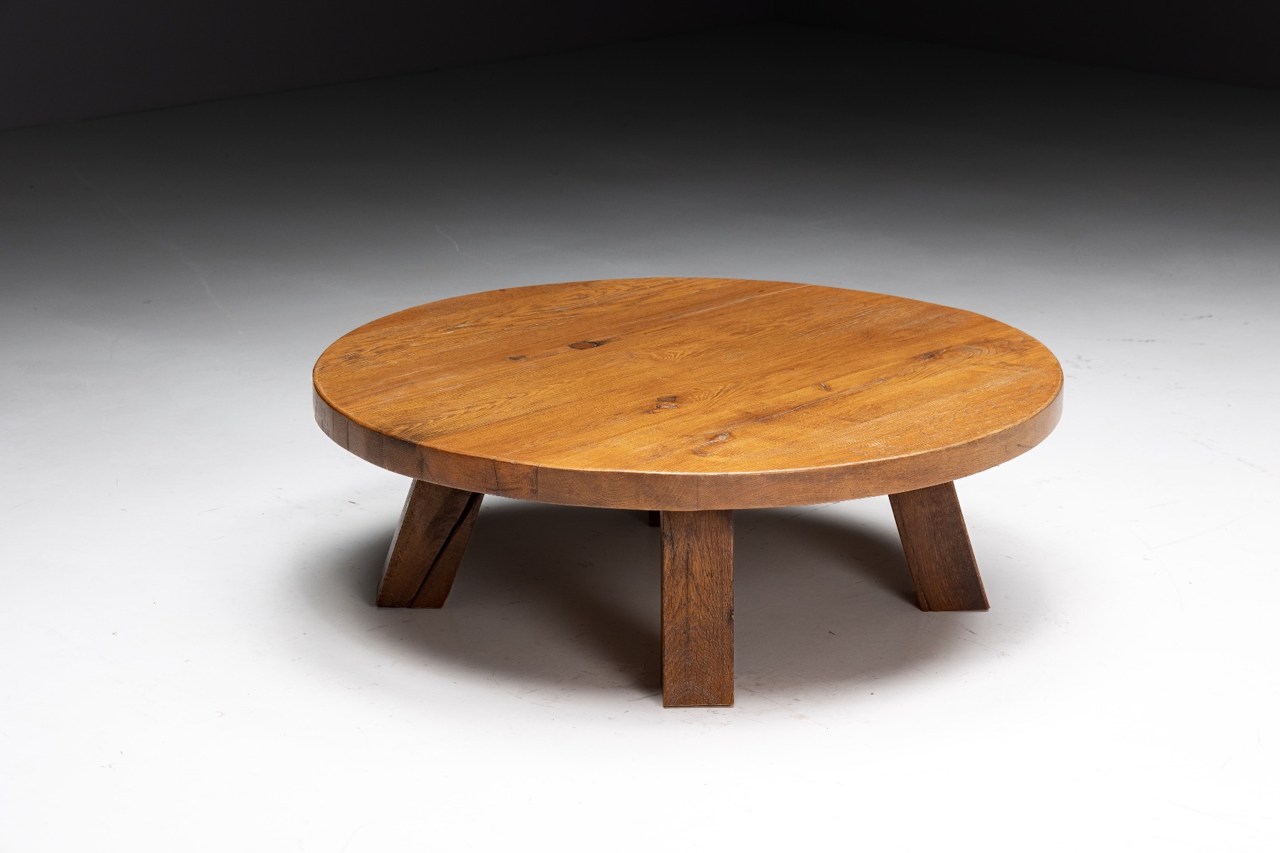 Rustic brutalist coffee table from France with round form