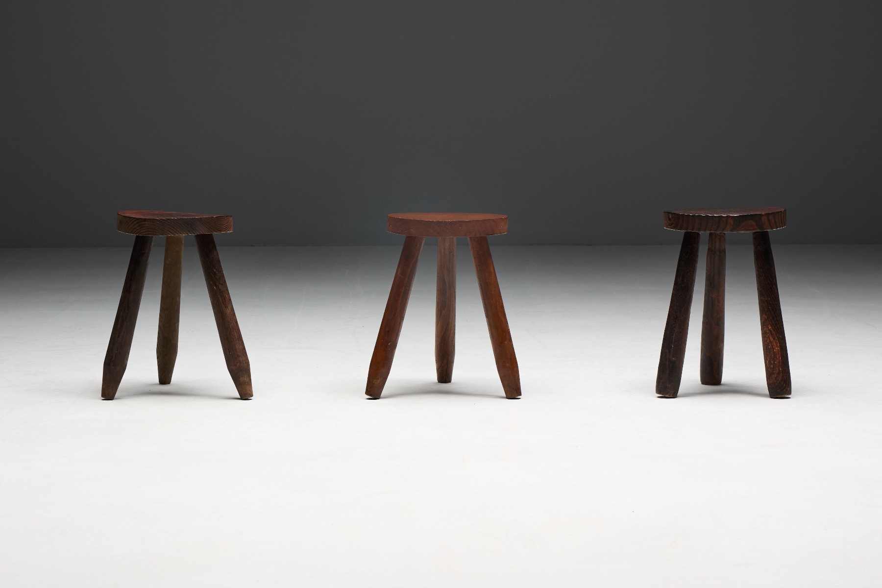 Rustic tripod stool with bold brutalist form